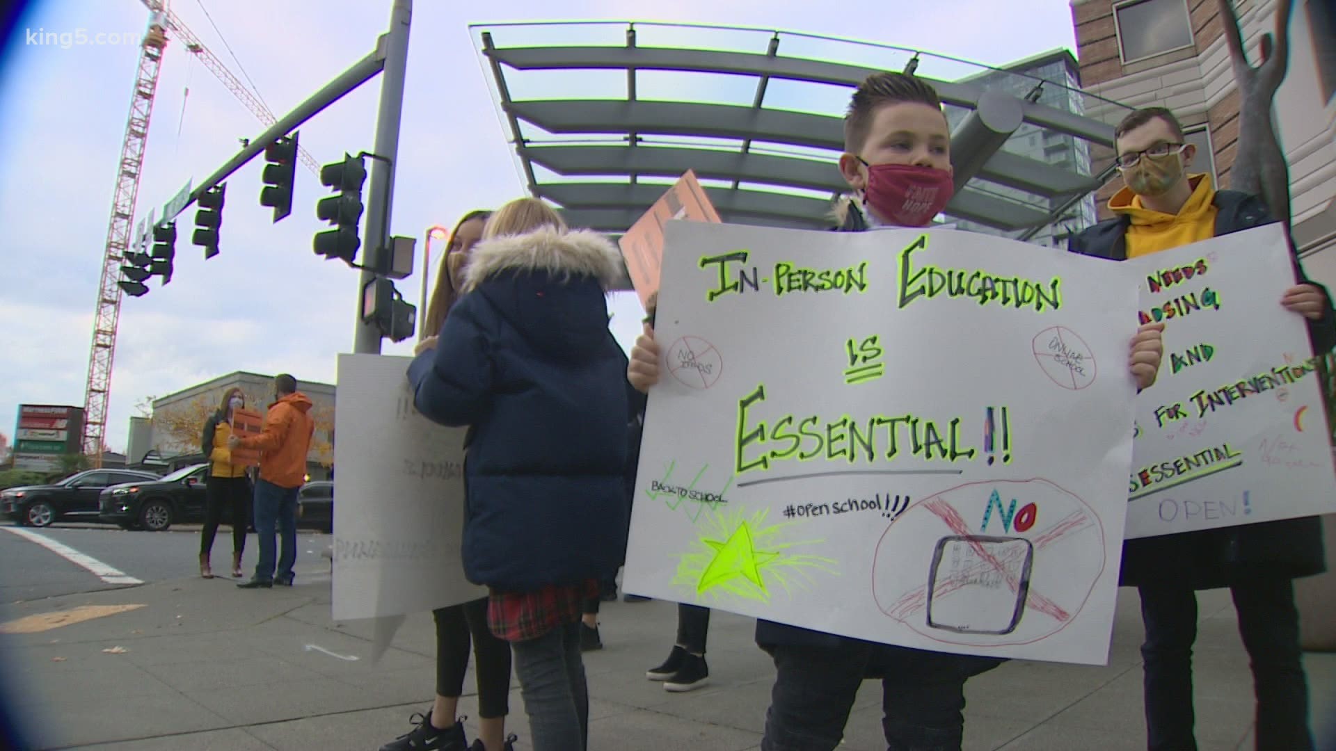 A group of students and parents held what they called "School is Essential Rally."