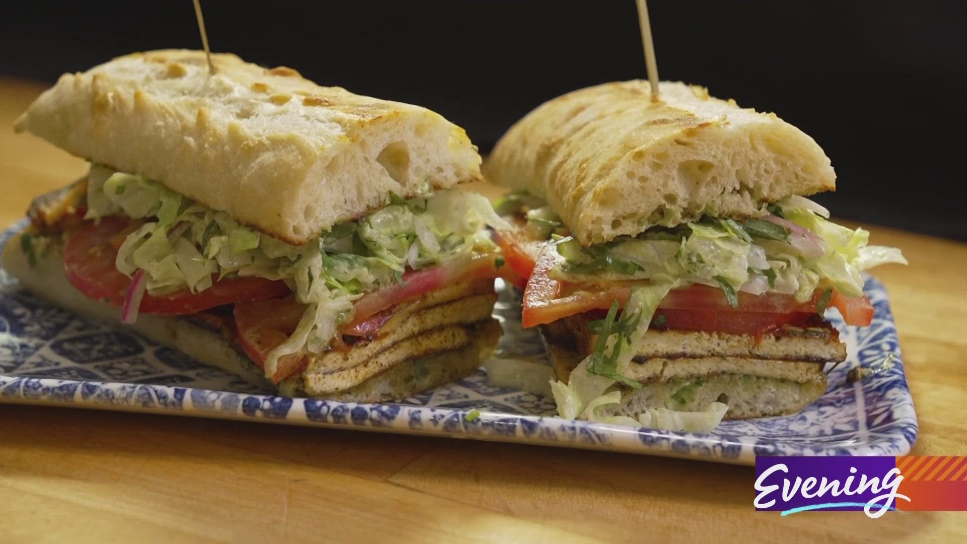 Crispy blackened tofu coated in Cajun spice gives the sandwich a burst of flavor.