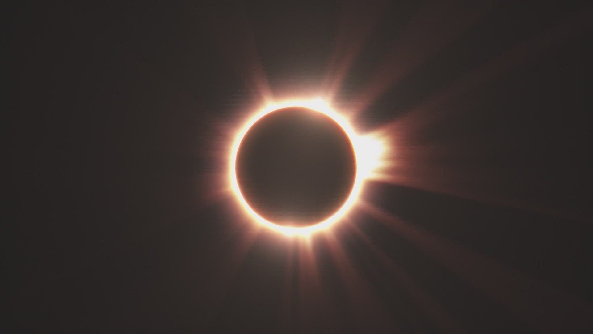 The moon, being farther away from us, appears smaller than the sun and does not fully cover it, resulting in the "ring of fire" illusion and makes an annular eclipse