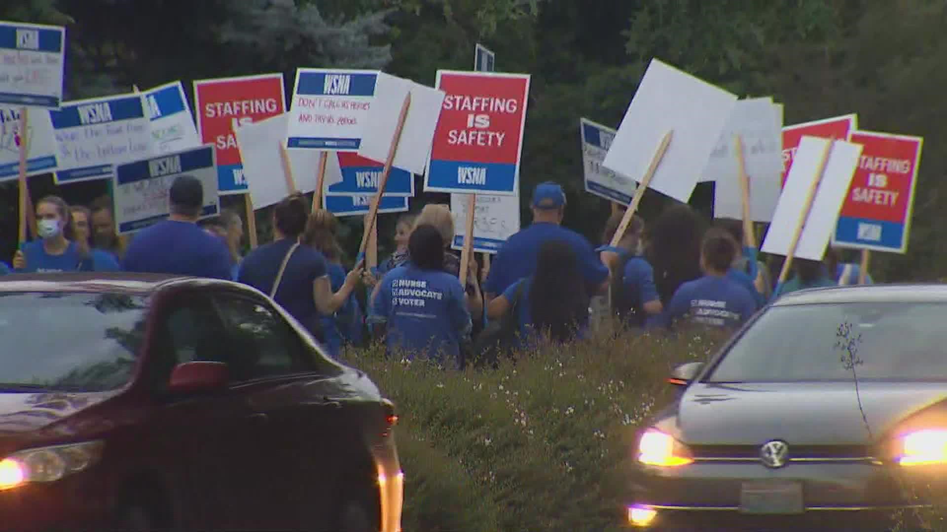 An informational picket outside Seattle Children's hospital was the latest in a number of efforts by Washington State Nurses Association members.