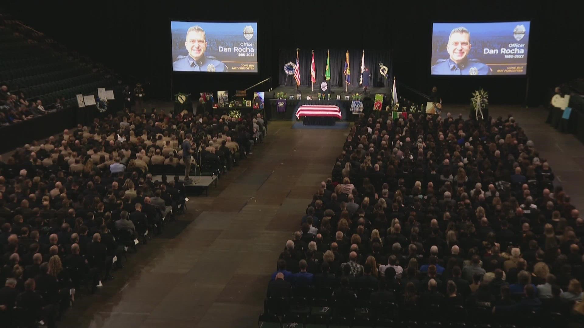 A memorial for officer Dan Rocha was held at the Angel of the Winds Arena.