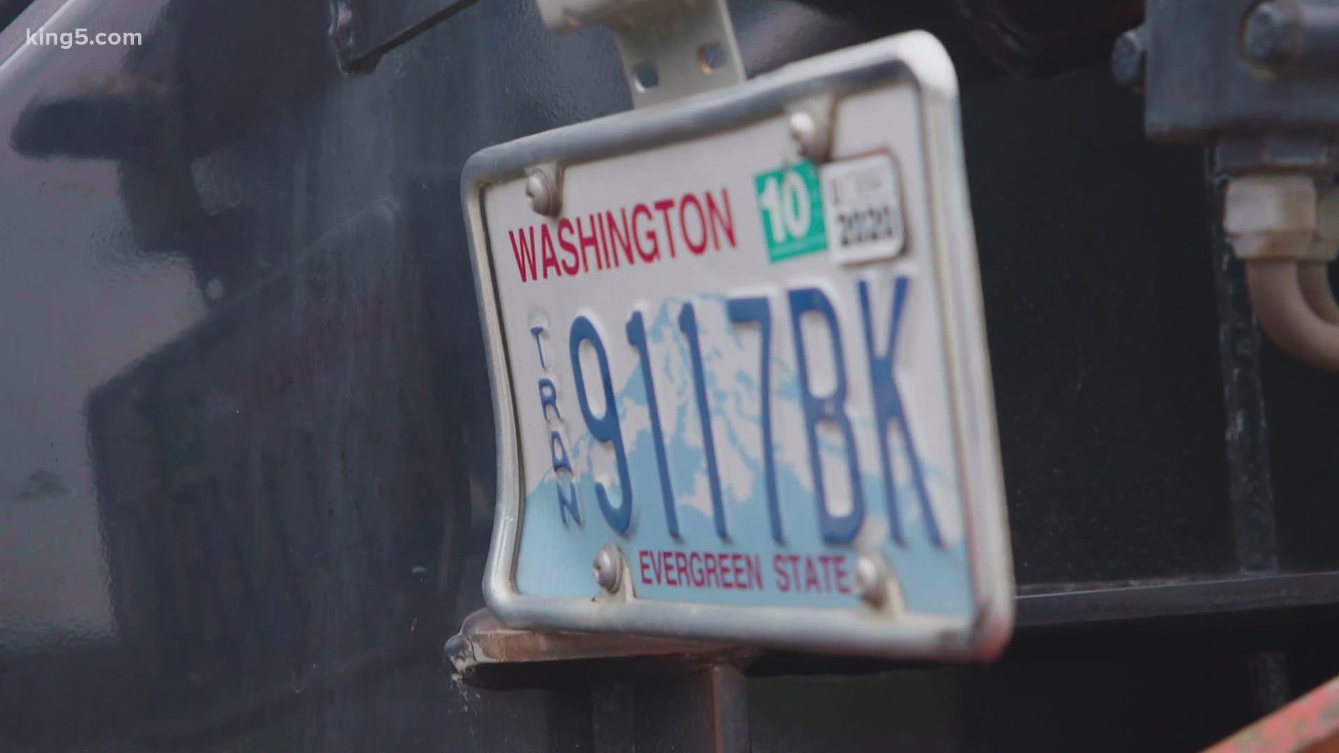 Washington state front license plate in window