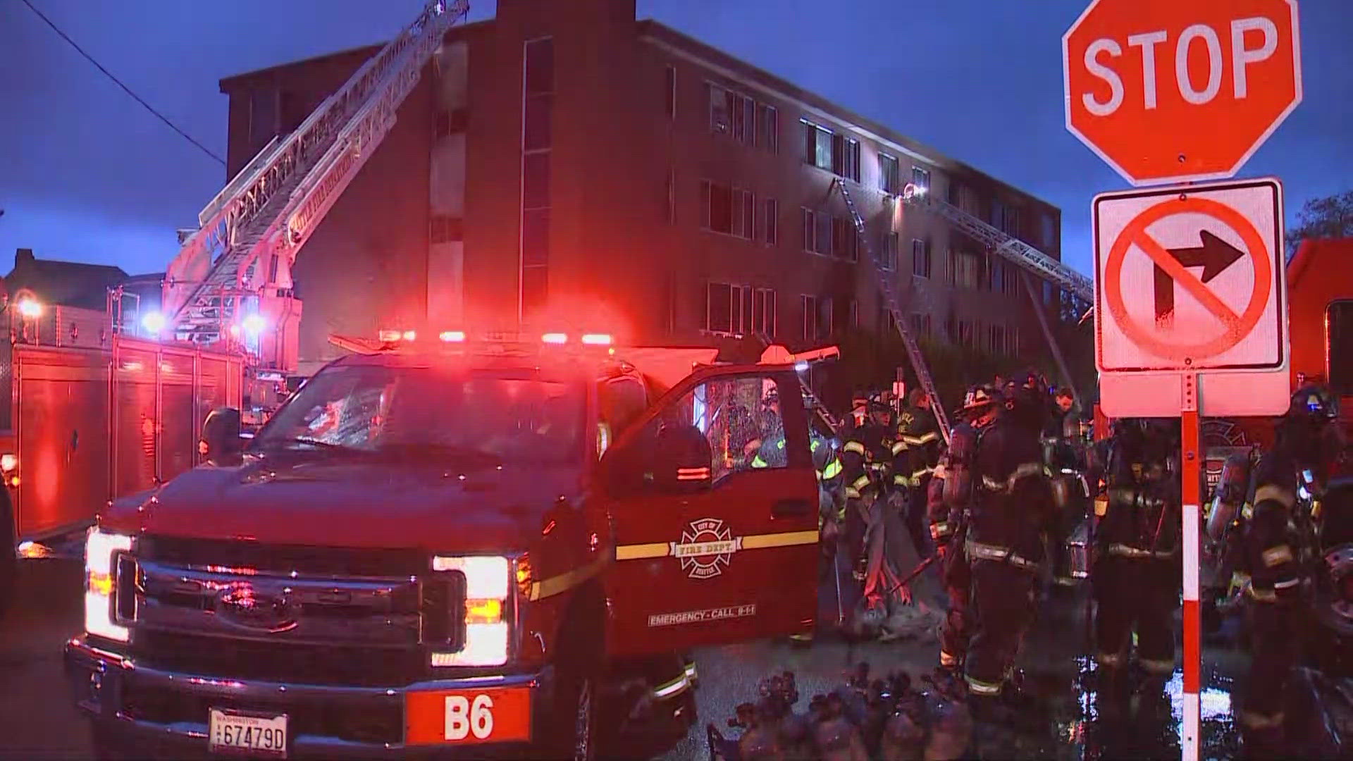 Four people were injured in a fire at the vacant Roosevelt Manor apartment building in Seattle's University District