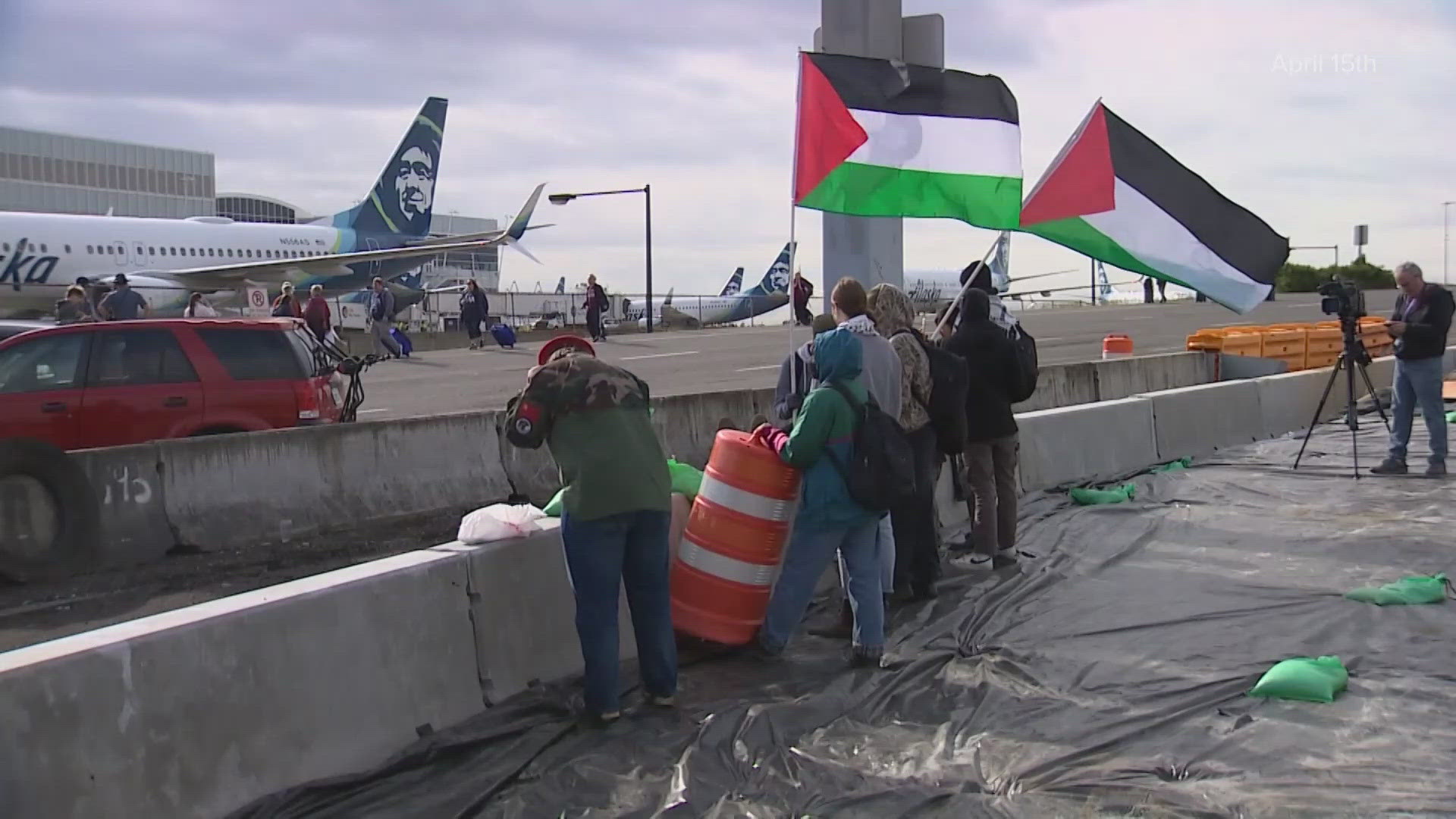 The city agreed to dismiss charges against 46 defendants who took part in a protest that blocked access to the airport for hours on April 15.