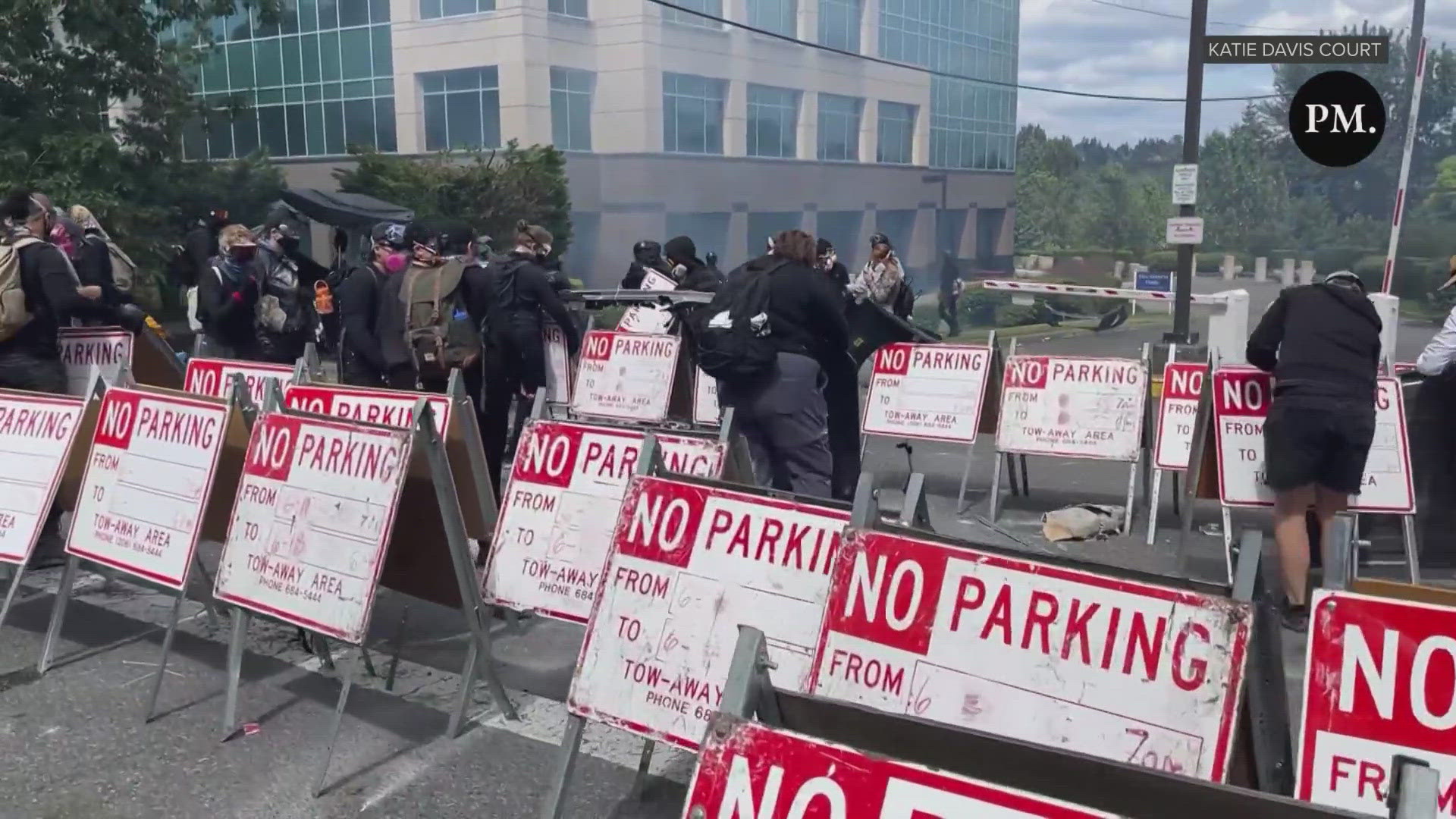 Tukwila police said officers used pepper spray against demonstrators outside of a Department of Homeland Security office on Saturday.