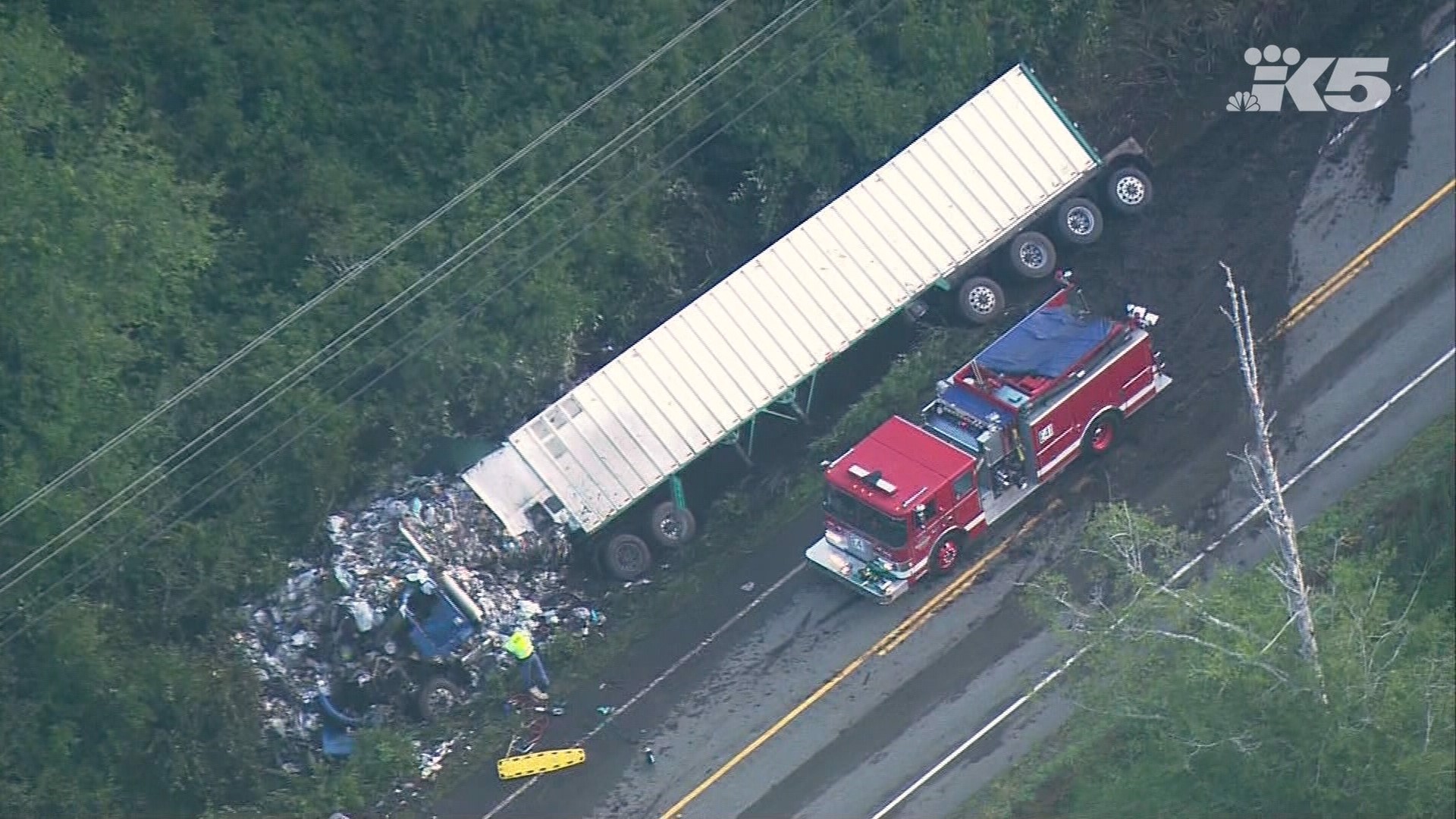 Truck full of garbage crashes on Highway 101 near Duckabush on the Olympic Peninsula.  The driver has been airlifted to Harborview Hospital.