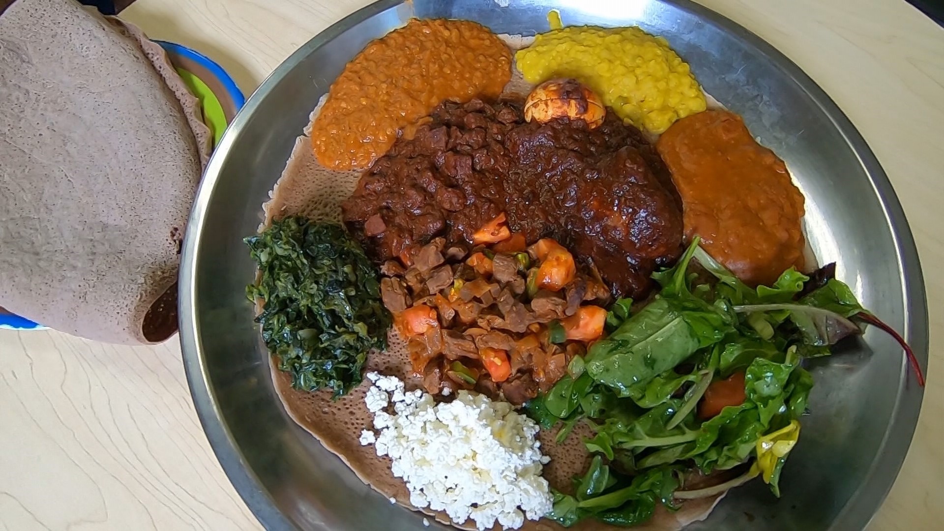 You won't get in trouble for eating with your hands here. From meat-based dishes to vegan and gluten-free delights, Ethiopian food has something for everyone.