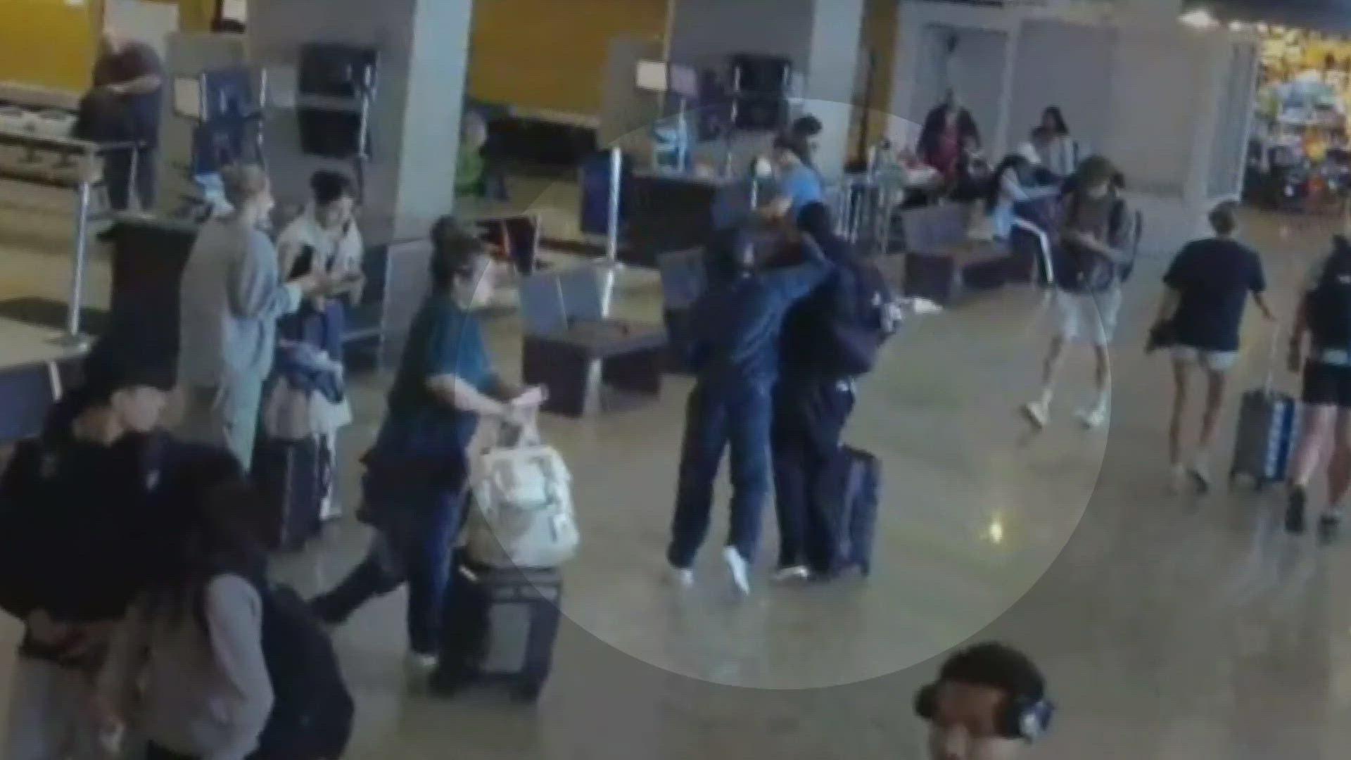 The Olympic track star was seen shoving her boyfriend, fellow Olympian Christian Coleman, in a packed terminal at Sea-Tac Airport 