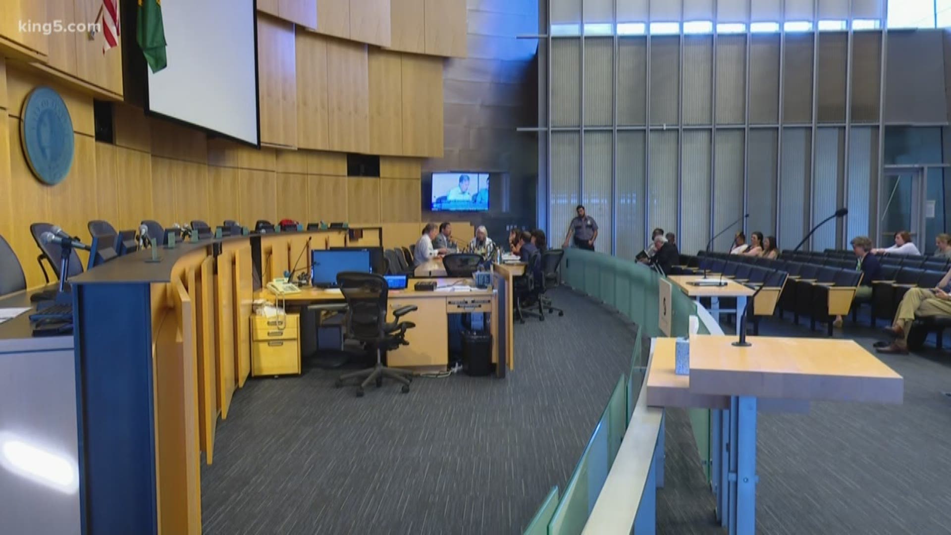 The Seattle City Council is debating what to do with the several million dollar surplus from the city's sweetened beverage tax.