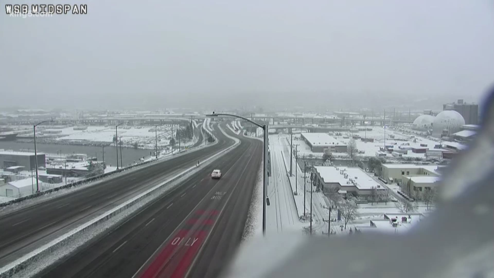 Seattle Department of Transportation deployed more than 30 plows to clear snow-covered roads overnight into Saturday morning.