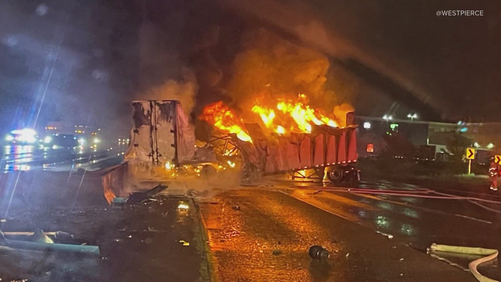 The driver of a semitruck hit a barrier and the truck caught fire. The driver died at the scene. 