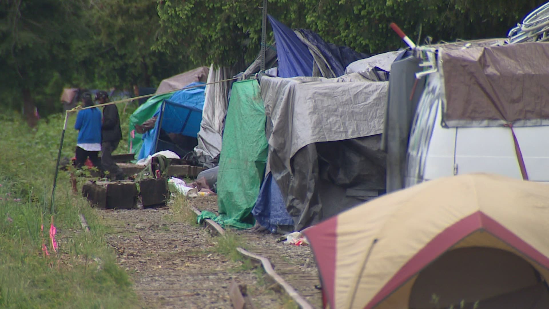 Officials gave out the Johnson & Johnson vaccine at an encampment along Deschutes Parkway, not far from the Capitol.