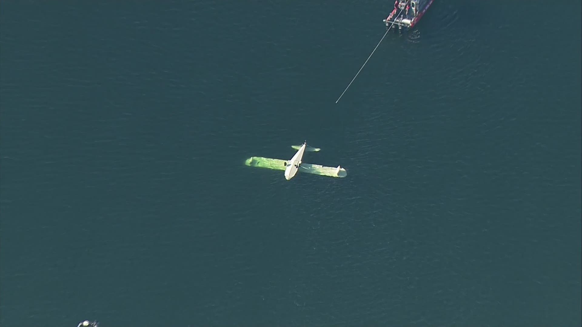A small plane crashed into Dyes Inlet near Silverdale on Tuesday afternoon. The pilot was the only person on board and survived with a minor facial injury.