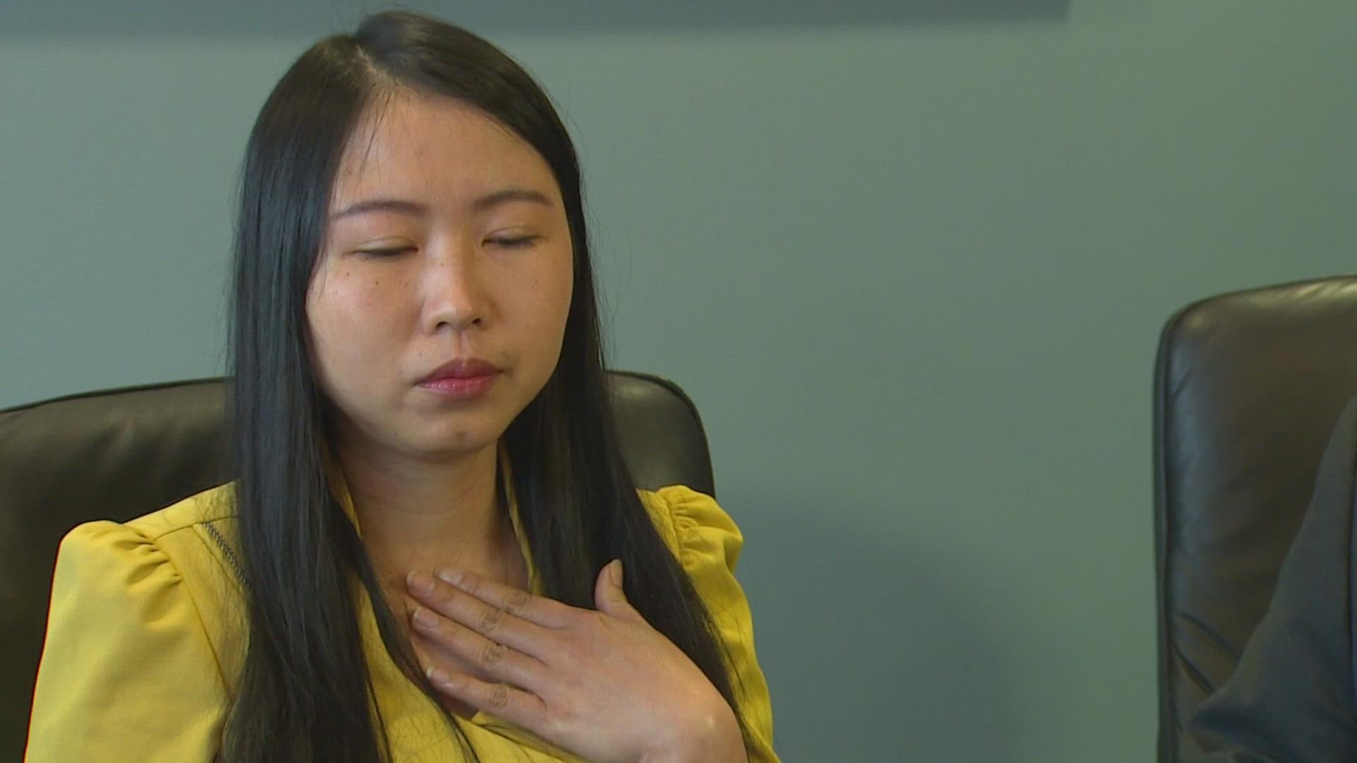 An Asian American woman says she caught a threat against her life on video and is now suing her neighbor for $100,000 in emotional damages.