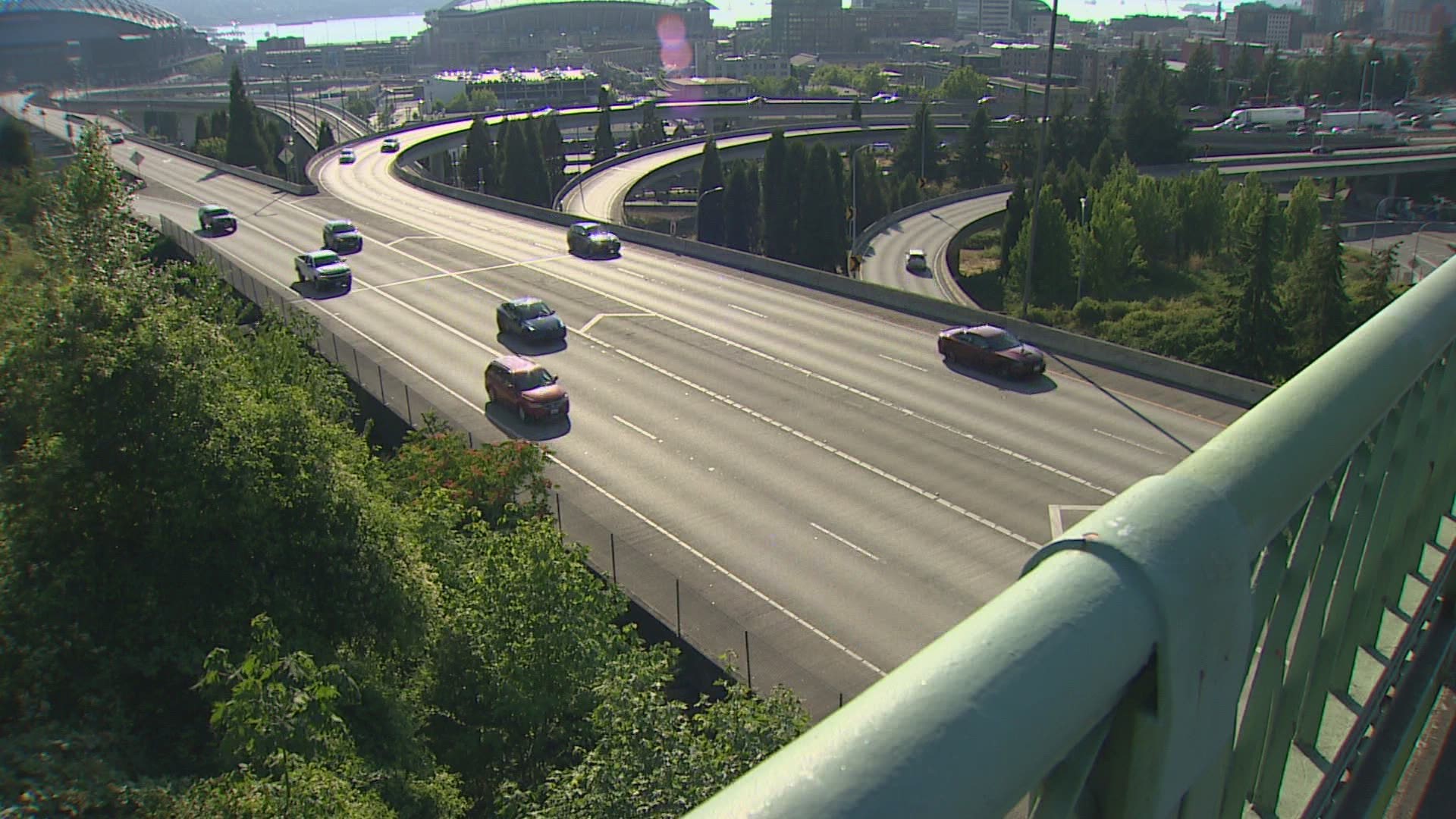 A scooter, shopping carts and propane tanks have all been tossed off overpasses along King County freeways creating dangerous conditions for drivers.