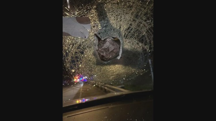 Video captures man launching rock through vehicle's windshield along I-5 in Seattle