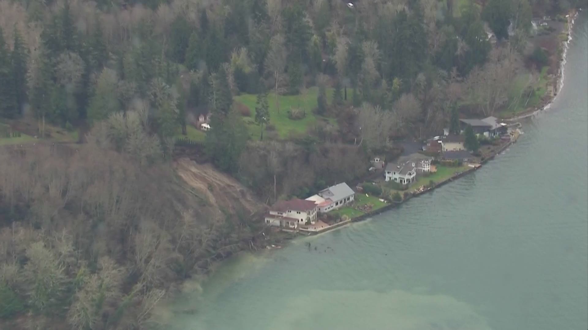 Eight homes on the Hood Canal were evacuated Monday night due to an active landslide that caused a boat house fire nearby.