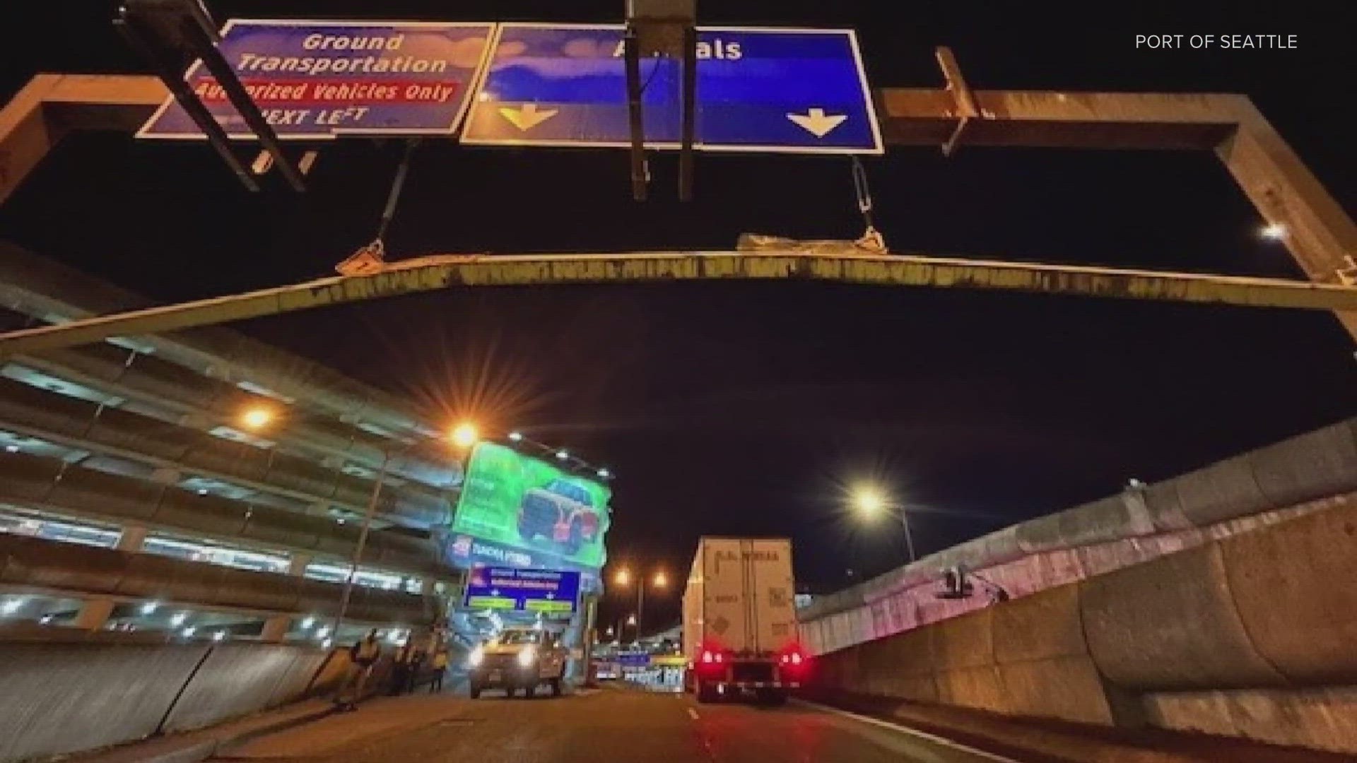 Earlier this week, a semi truck driver crashed into a height warning bar outside Seattle-Tacoma International Airport. Repair work was completed early Saturday.