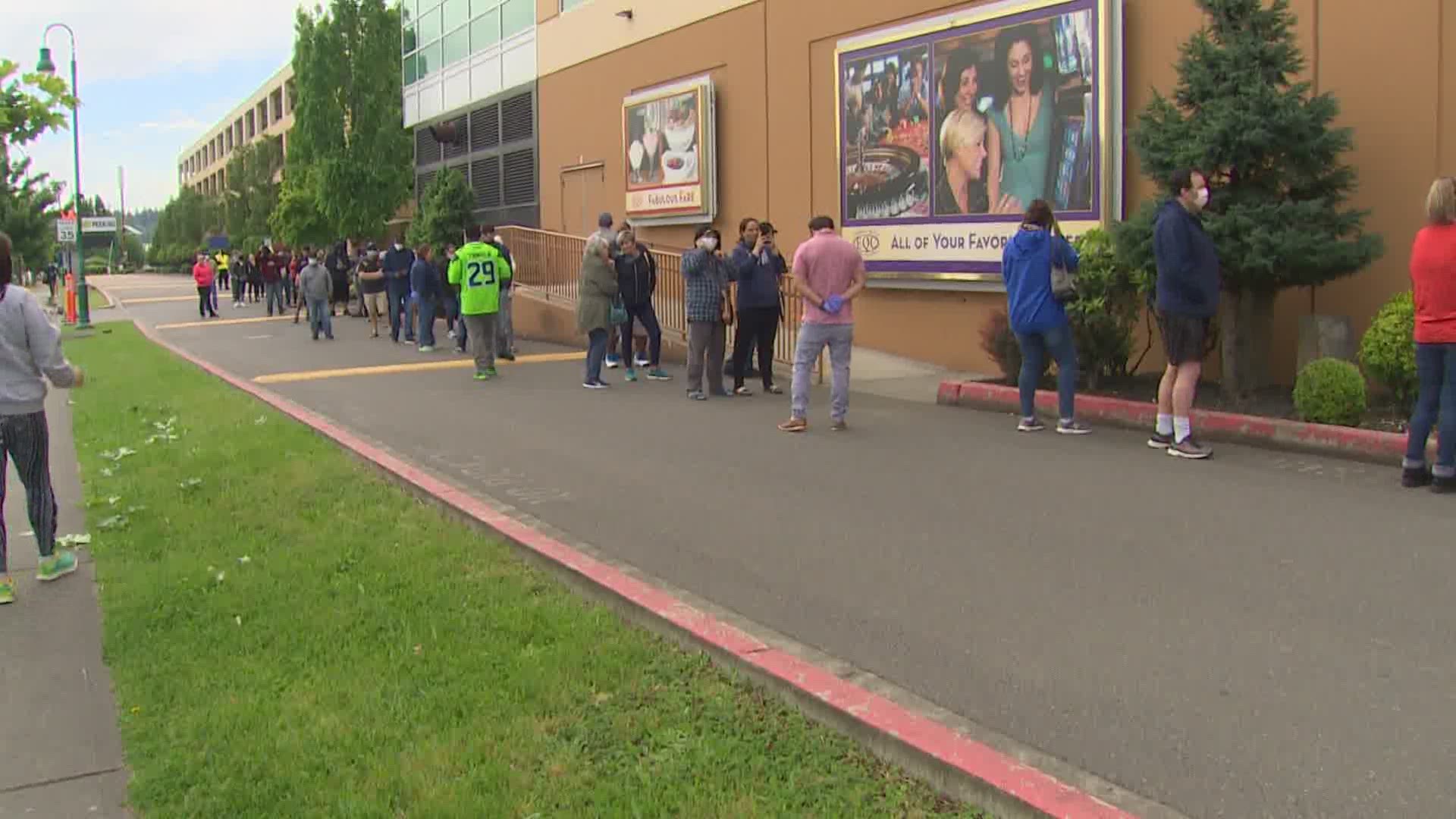 Hundreds waited in line to be screened before entering Emerald Queen Casino. Several area casinos have reopened after closing to slow the area spread of coronavirus