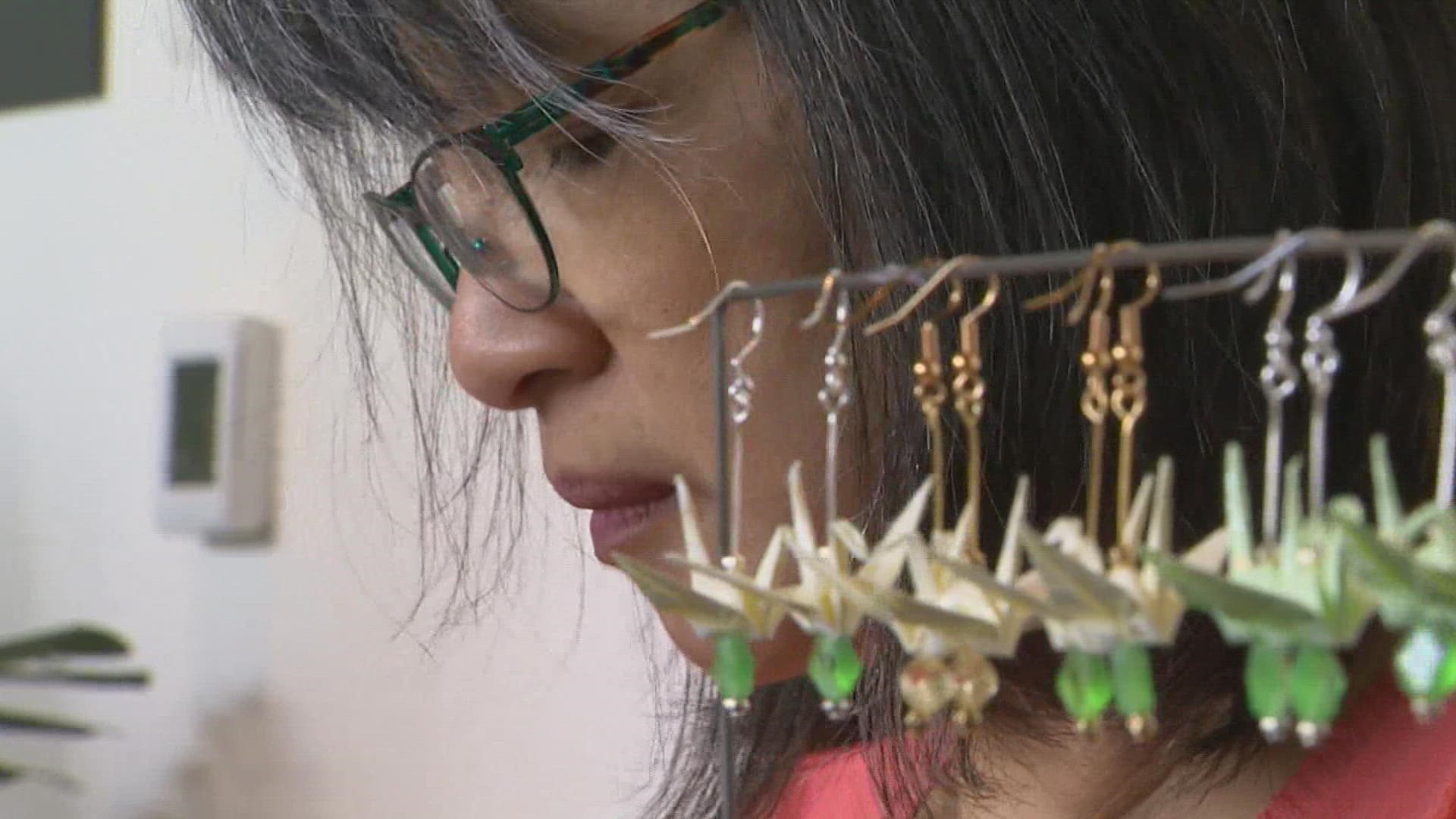 Edmonds artist Fay Lim is fighting back using a beloved Asian tradition to foster harmony. Lim is making jewelry adorned with cranes.