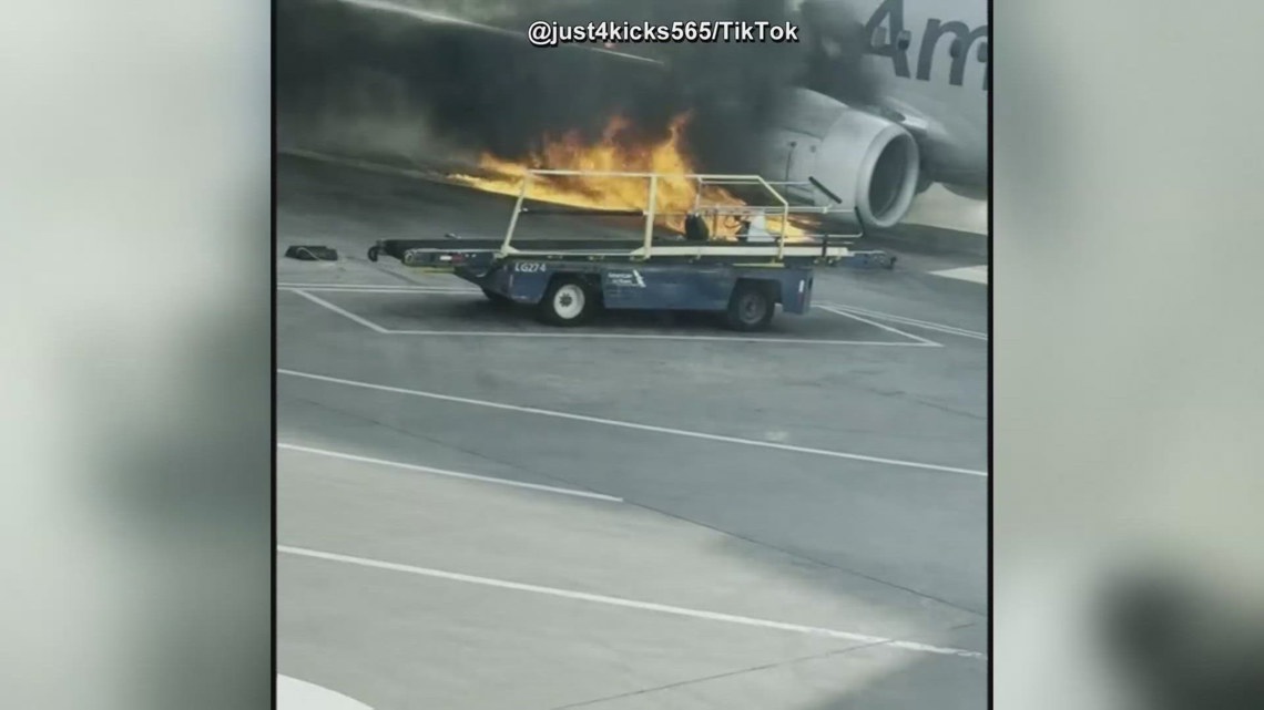 Video shows passengers evacuating from burning plane in Denver | king5.com