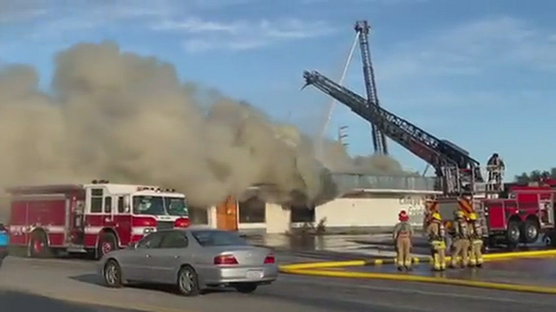 Multiple fire agencies are fighting a structure fire in the former College Way Grocery on College Way. Video shot July 21, 2023.
Credit: Mark Anderson