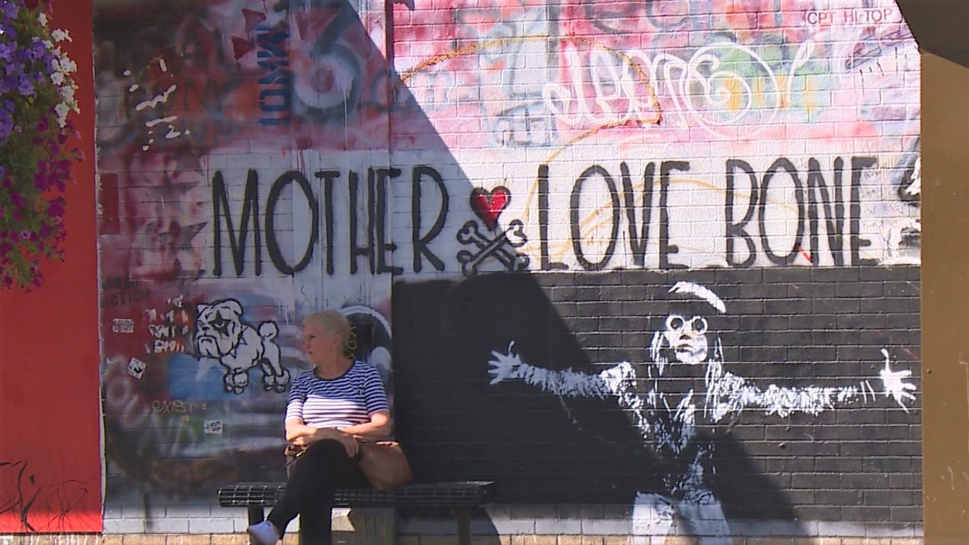 The "Mother Love Bone" mural on the walls of Easy Street Records was painted by Pearl Jam's Jeff Ament