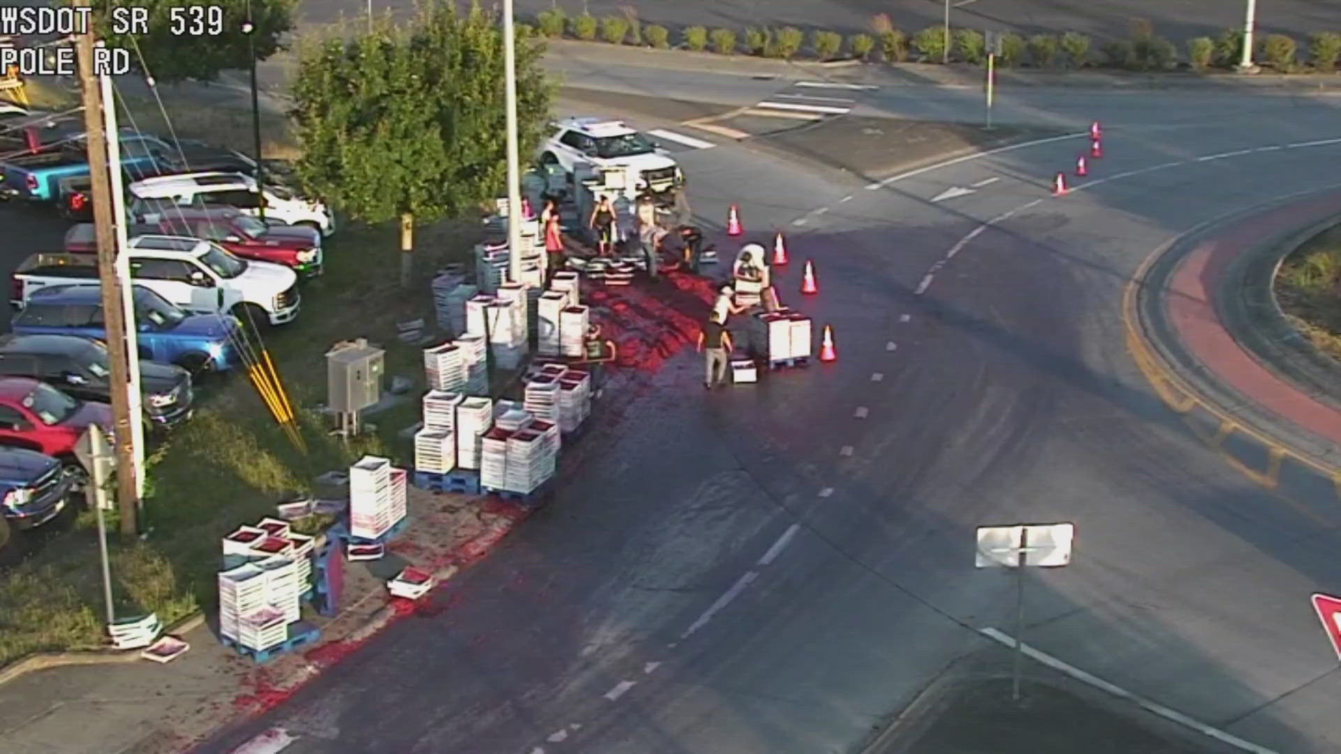 Red raspberries covered the road in Washington on Wednesday night. Police cited the truck driver who was carrying the unsecured load.