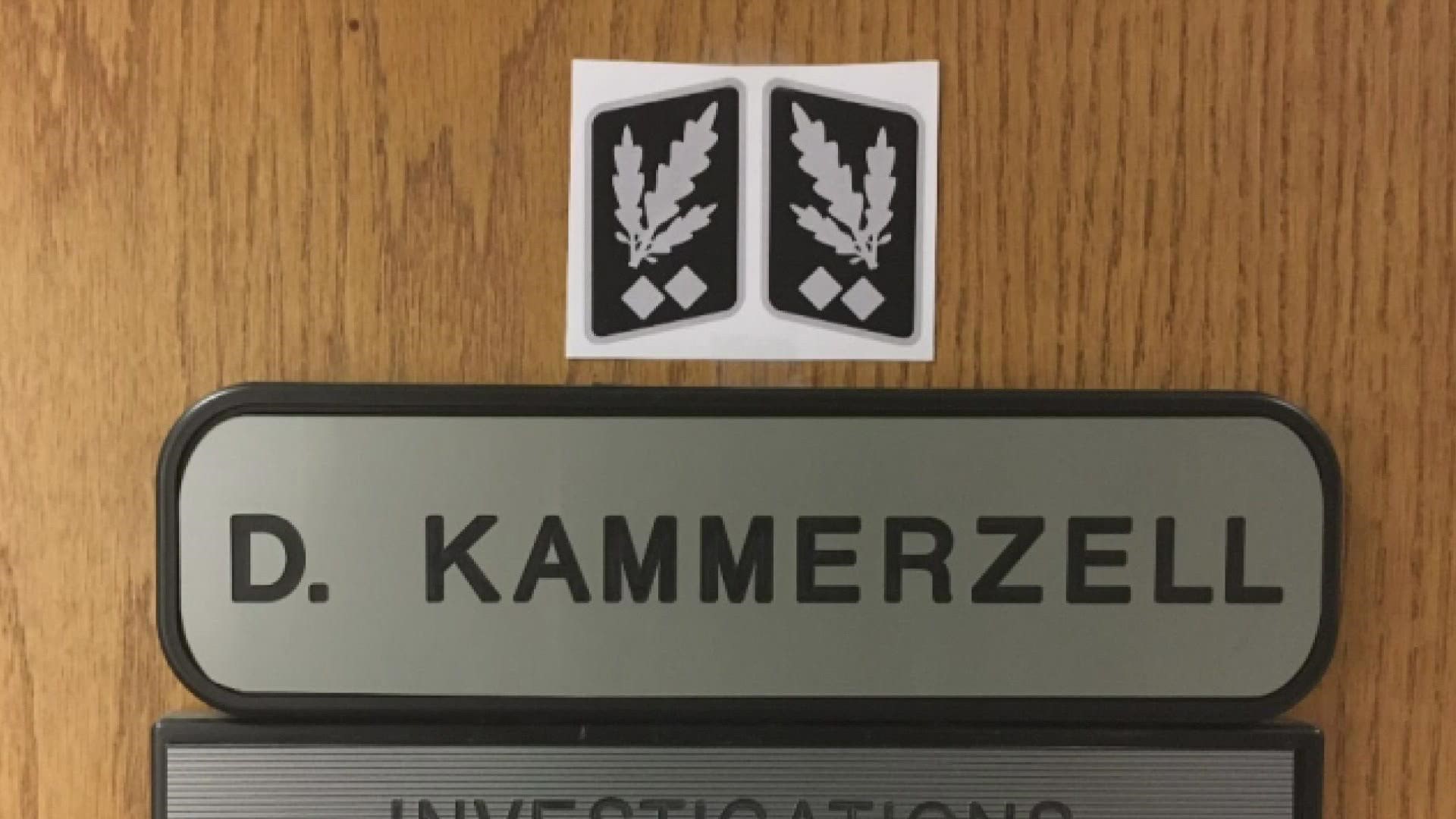 An assistant chief and 27-year veteran of the Kent Police Department was disciplined for displaying a Nazi insignia on his office door.