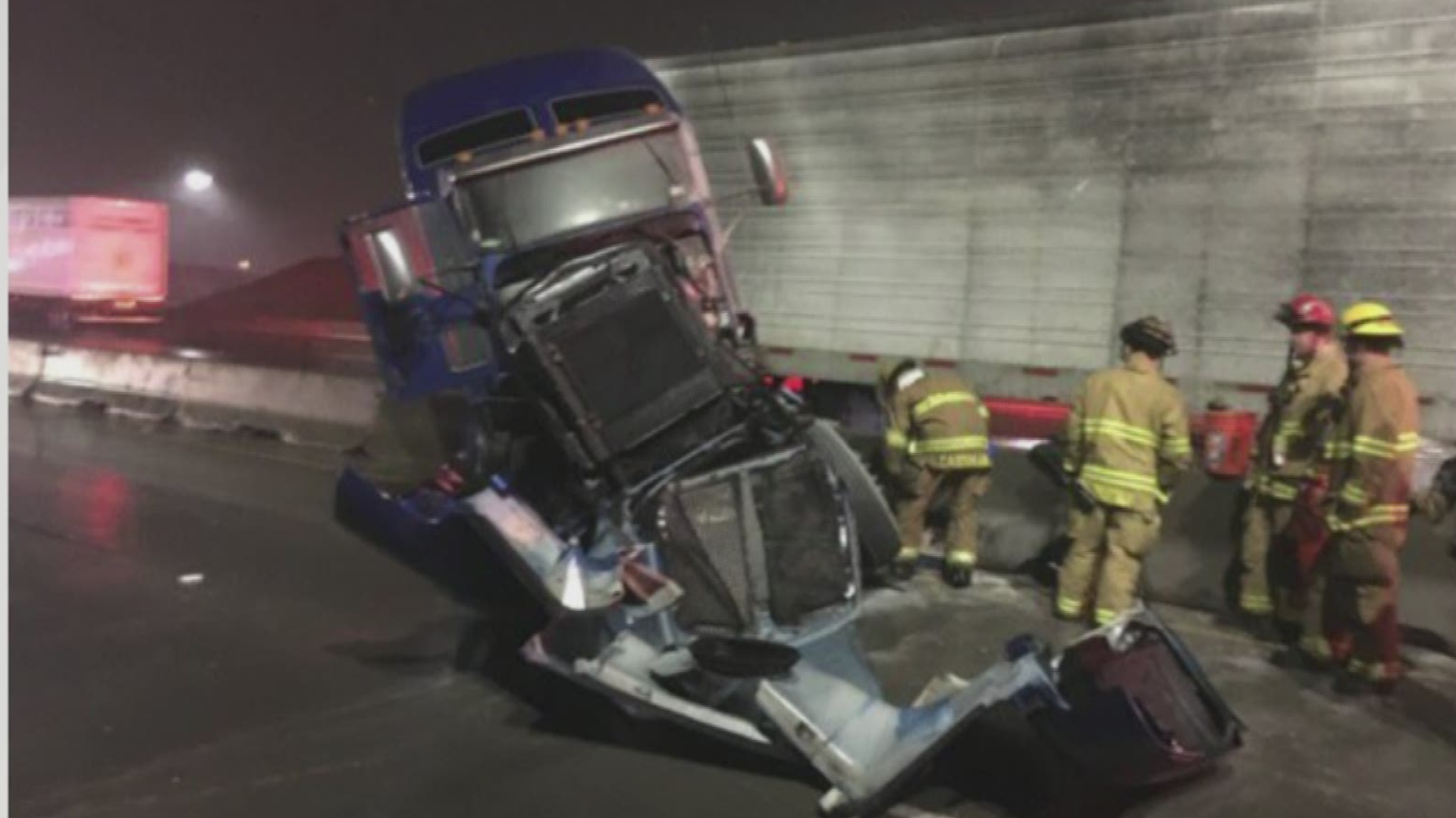 The truck slammed into a jersey barrier, doing significant damage to the cab.