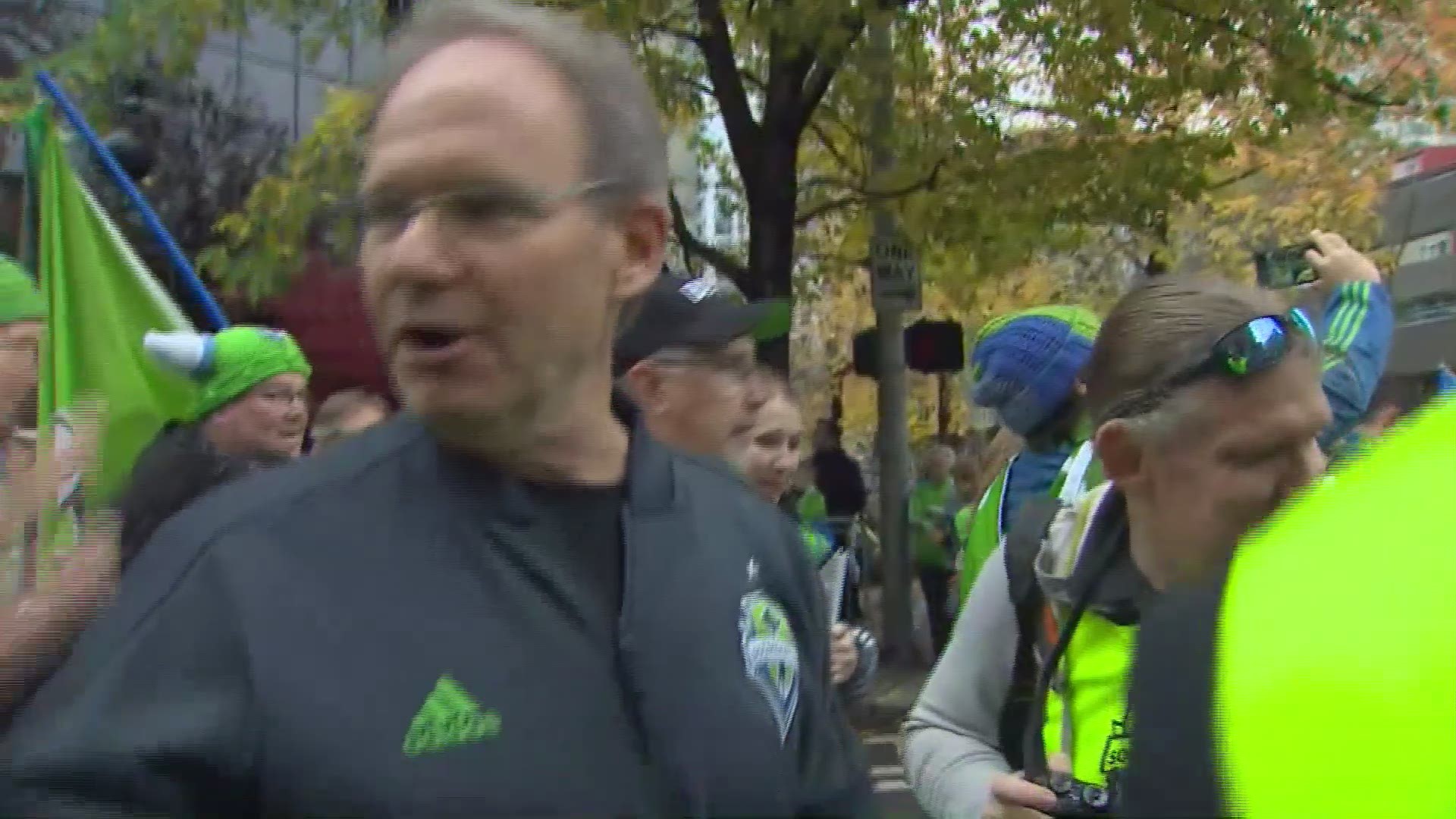 Sounders Head Coach Brian Schmetzer hopped off the team bus to mingle with fans in the crowd, who later chanted his name.