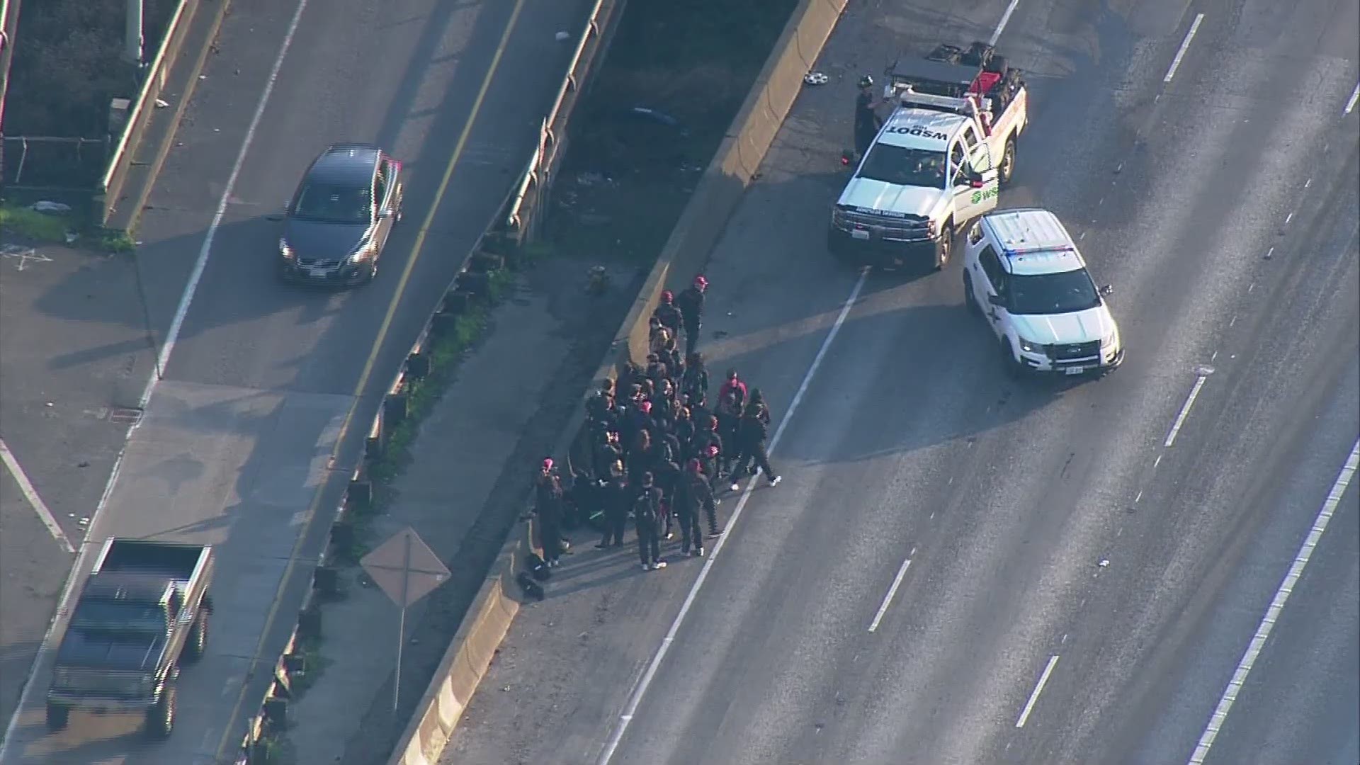 The Stanford track team was on a charter bus in Seattle that caught fire in downtown Seattle Friday afternoon. No one was hurt and the students cheered when they saw crews saved their luggage.