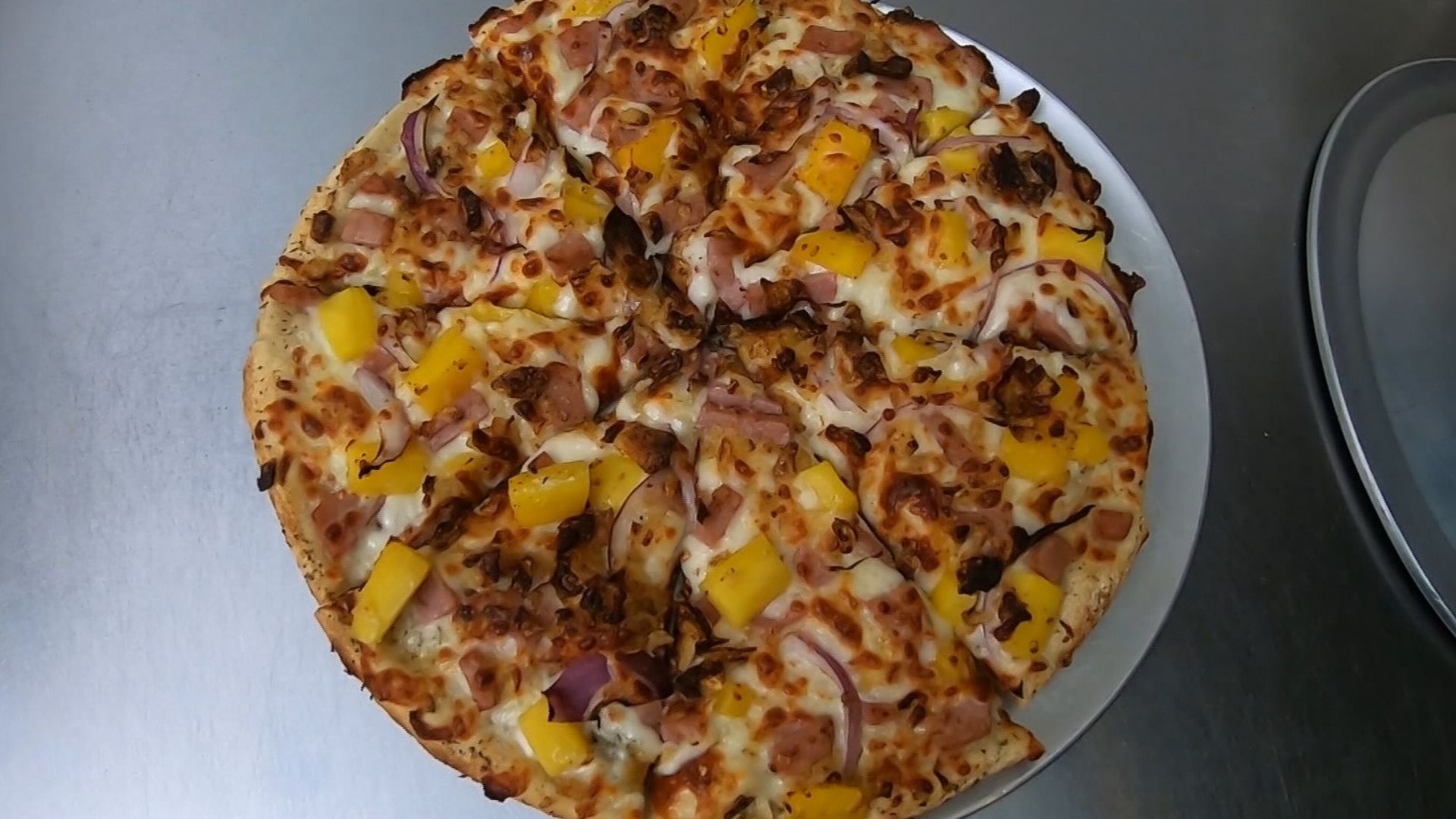 The Tiki Tap House specializes in island-inspired pizzas.