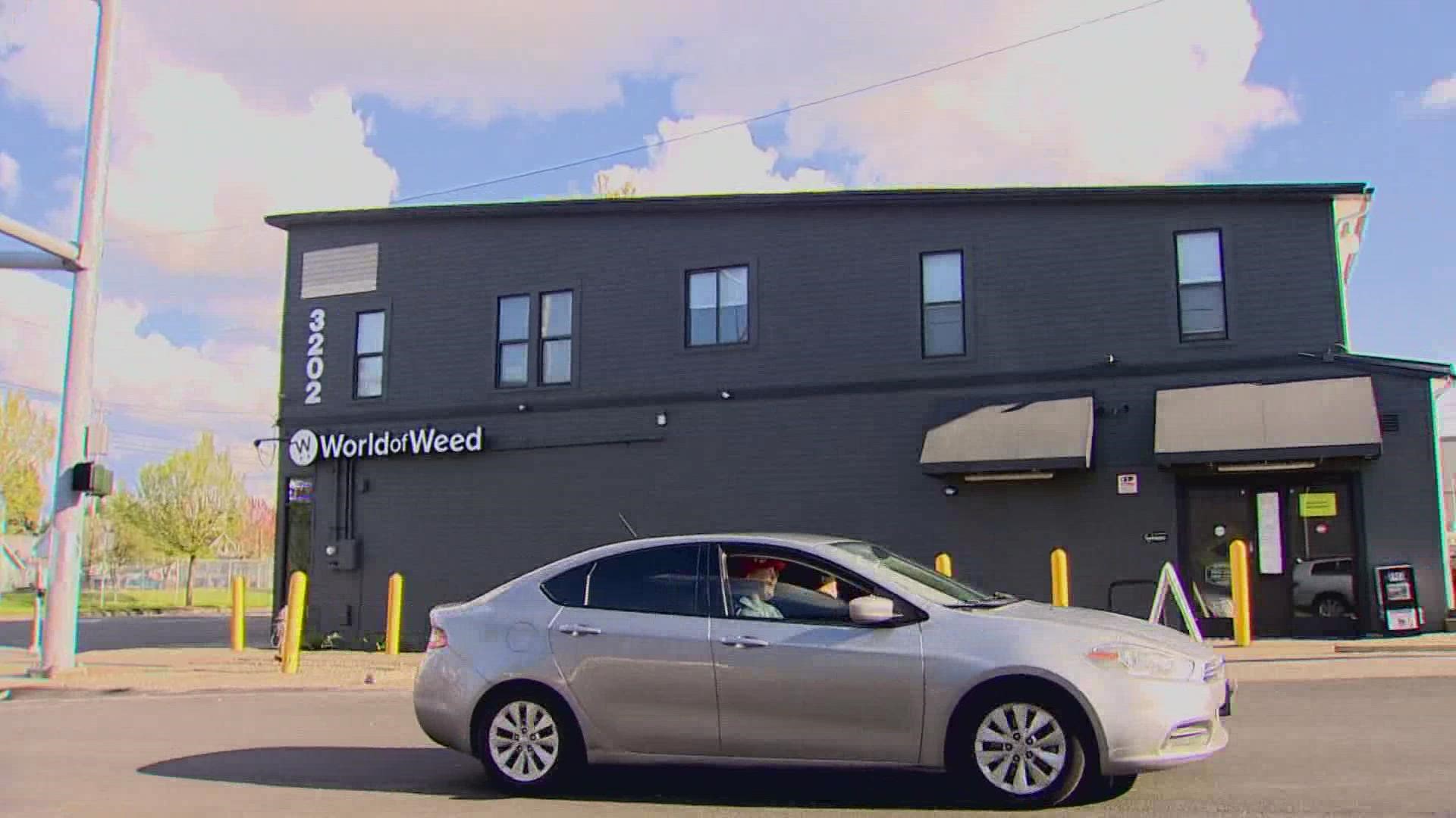 World of Weed reopened Tuesday after closing for over a month following the killing of a 29-year-old employee in an armed robbery.