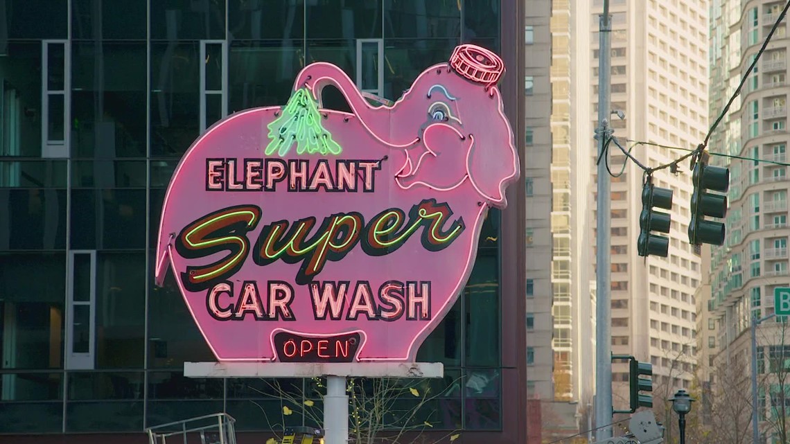 Pink Elephant Car Wash sign now lit up on Amazon's campus | king5.com