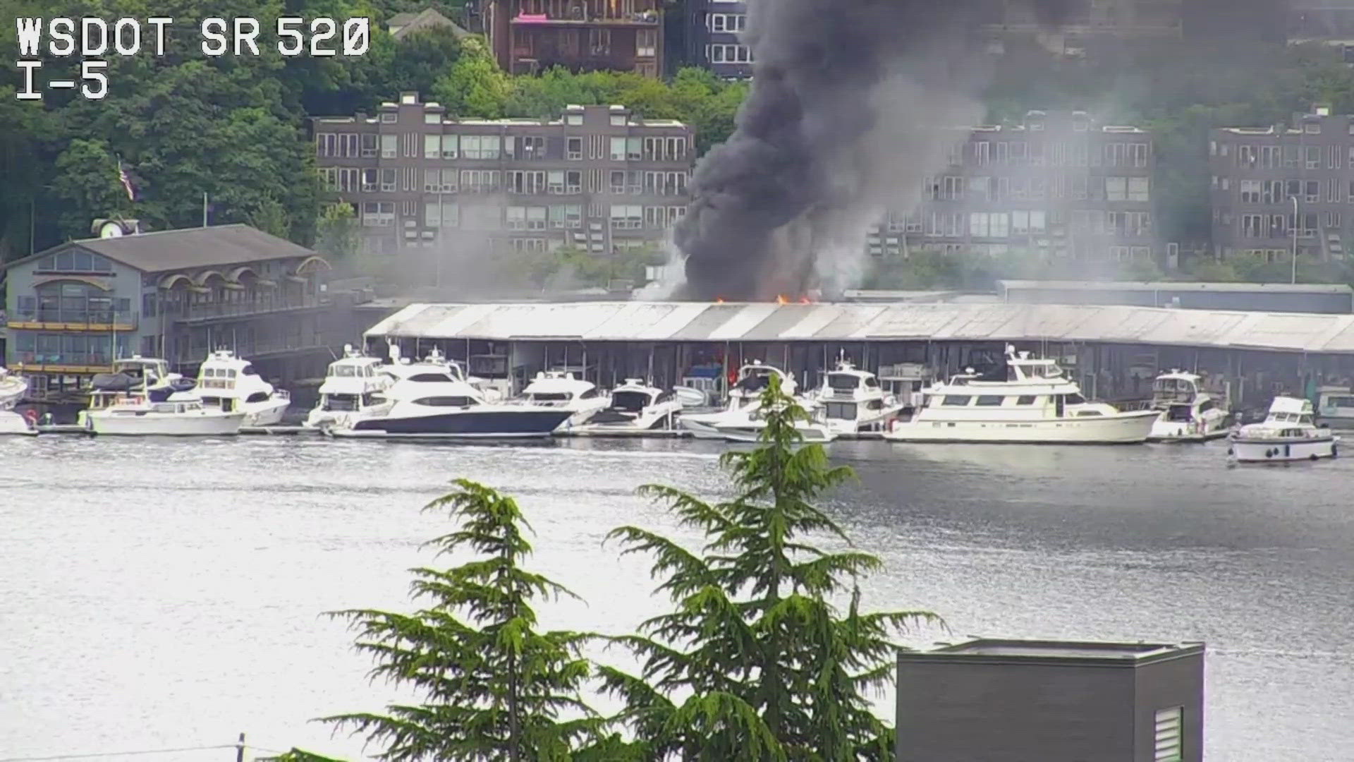 Seattle firefighters are responding to the fire near Westlake Avenue North on June 25.