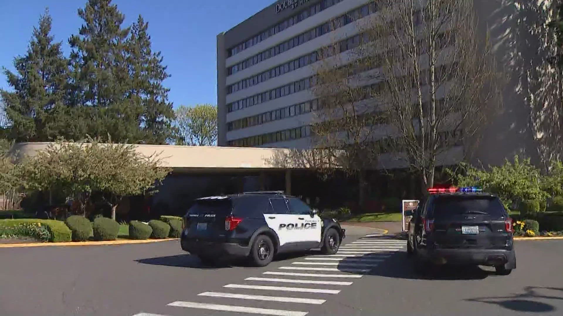 The shooting happened at the DoubleTree Suites by Hilton. According to police, one officer was grazed by a bullet and was treated for minor injuries.