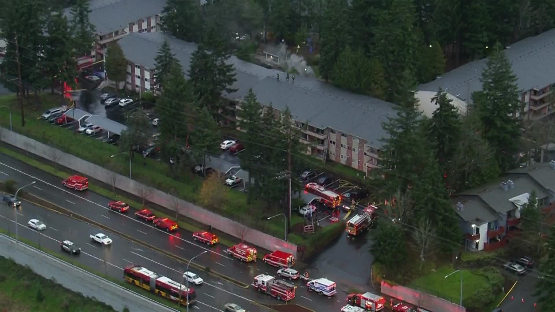 Crews reportedly staged multiple ladder and balcony rescues already at an apartment building on Pacific Highway South.