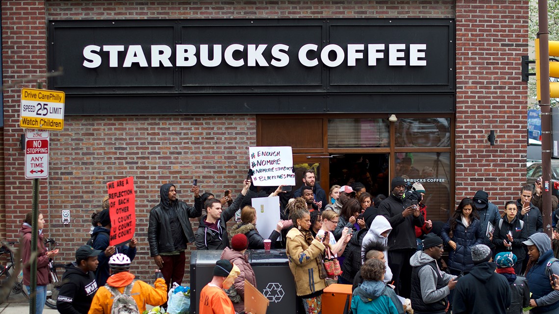 Starbucks reaches settlement with arrested black men