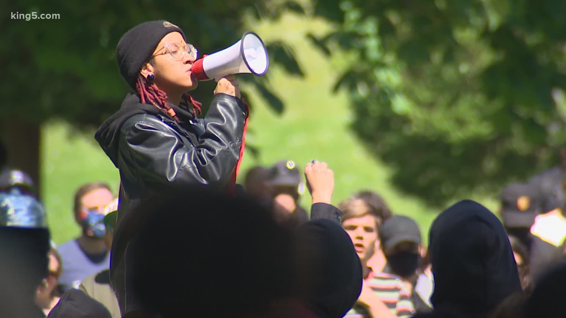 Protesters in Tacoma gathered peacefully to get their message out in Wright Park on Monday. The rally was organized by a high school student.