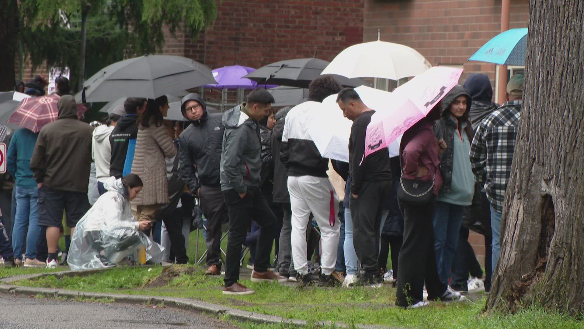 A voter said they saw an 83-year-old woman wait six hours in the rain to vote.