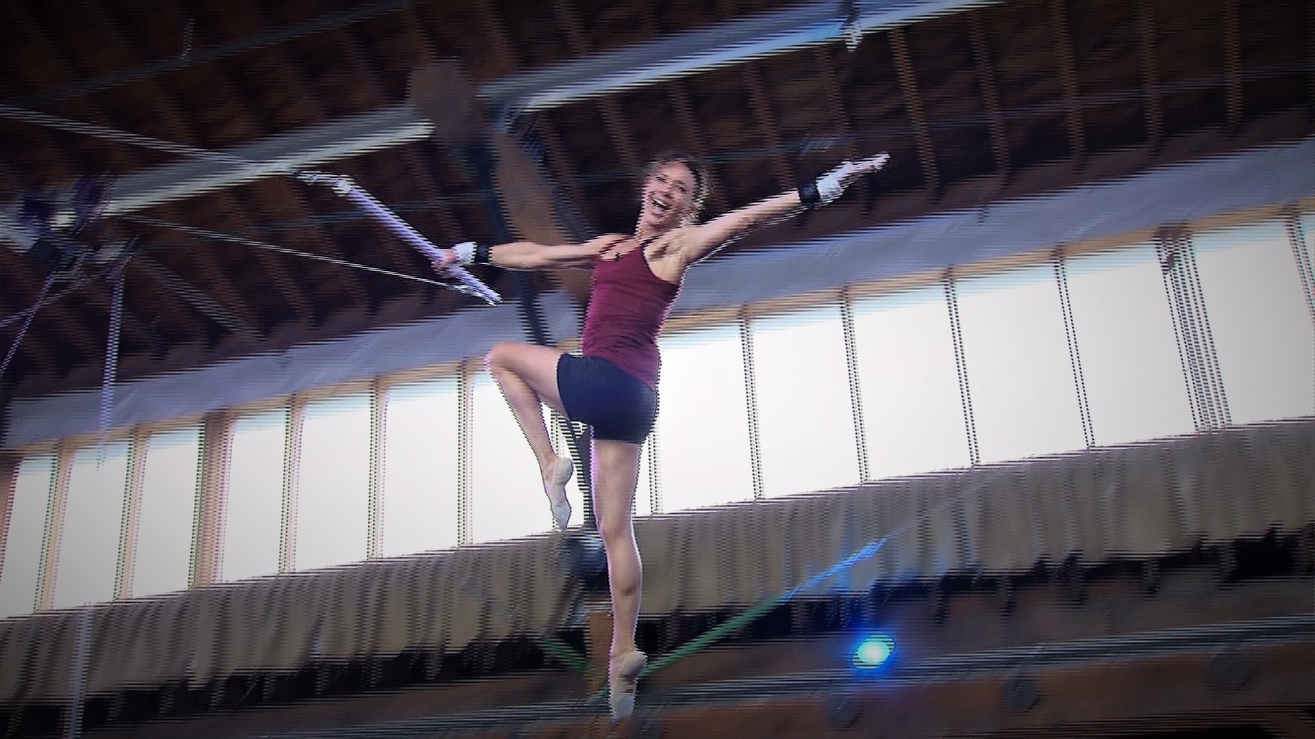 An older trapeze artist mid-performance, proving that age is no barrier to defying gravity and pursuing passion
