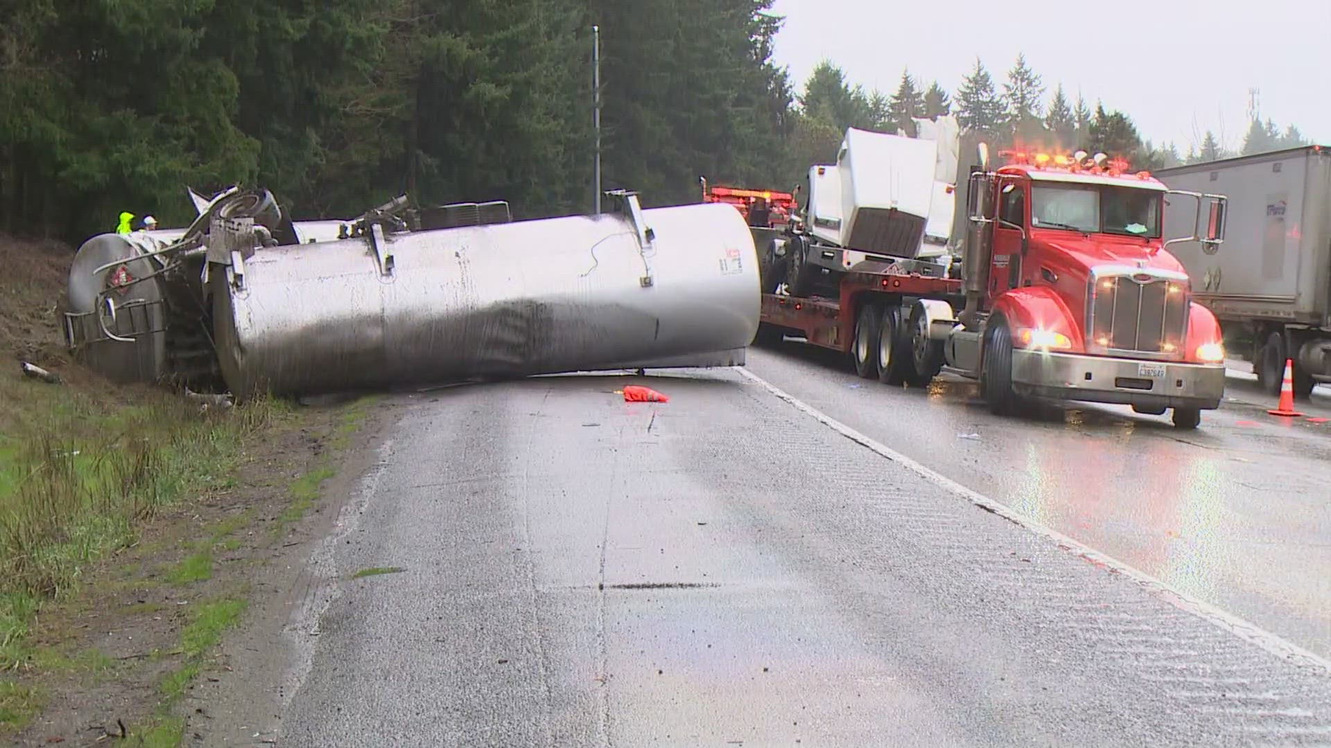 Two people were injured in a semi-truck rollover crash on I-5 S at Carpenter Rd. NE in Lacey Monday morning.