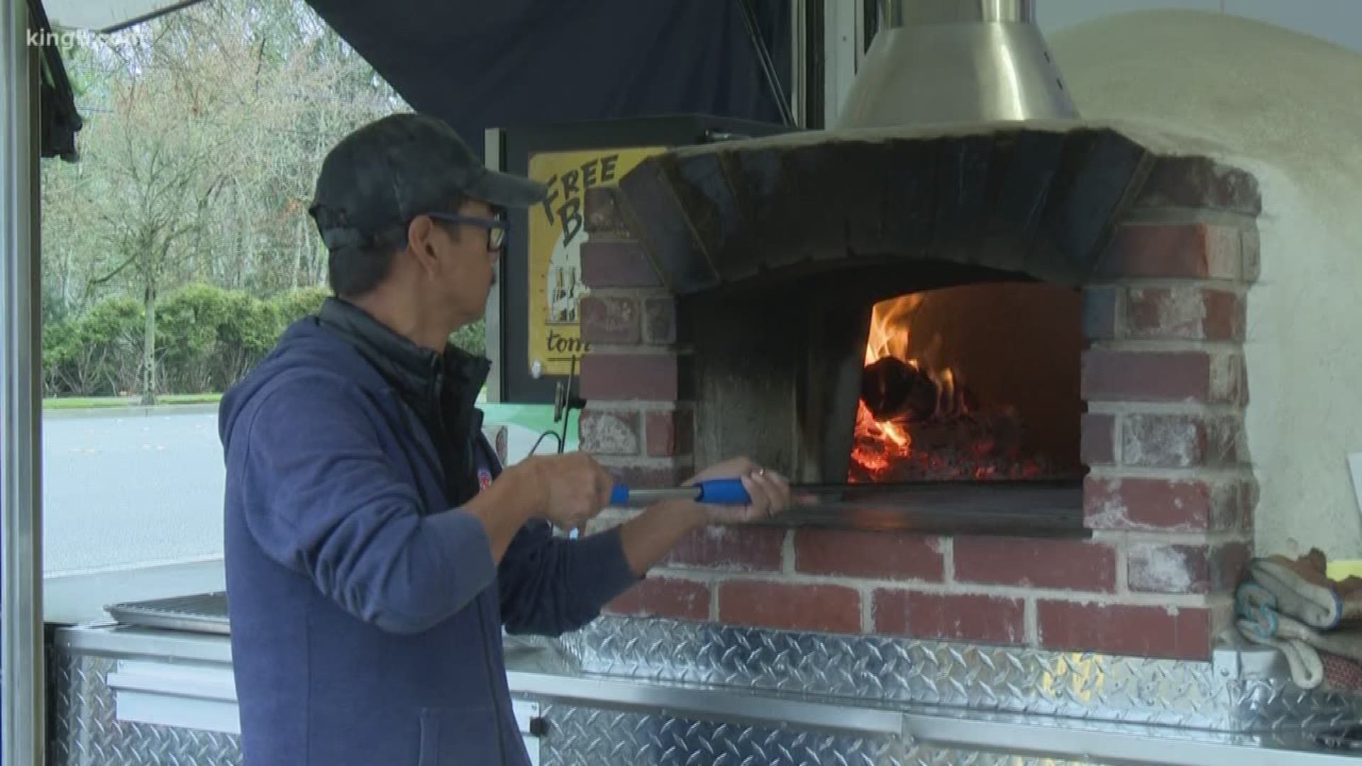 Bellevue's "In Pizza We Crust" uses a hand-built wood-fired stove on their food truck to offer a unique taste.