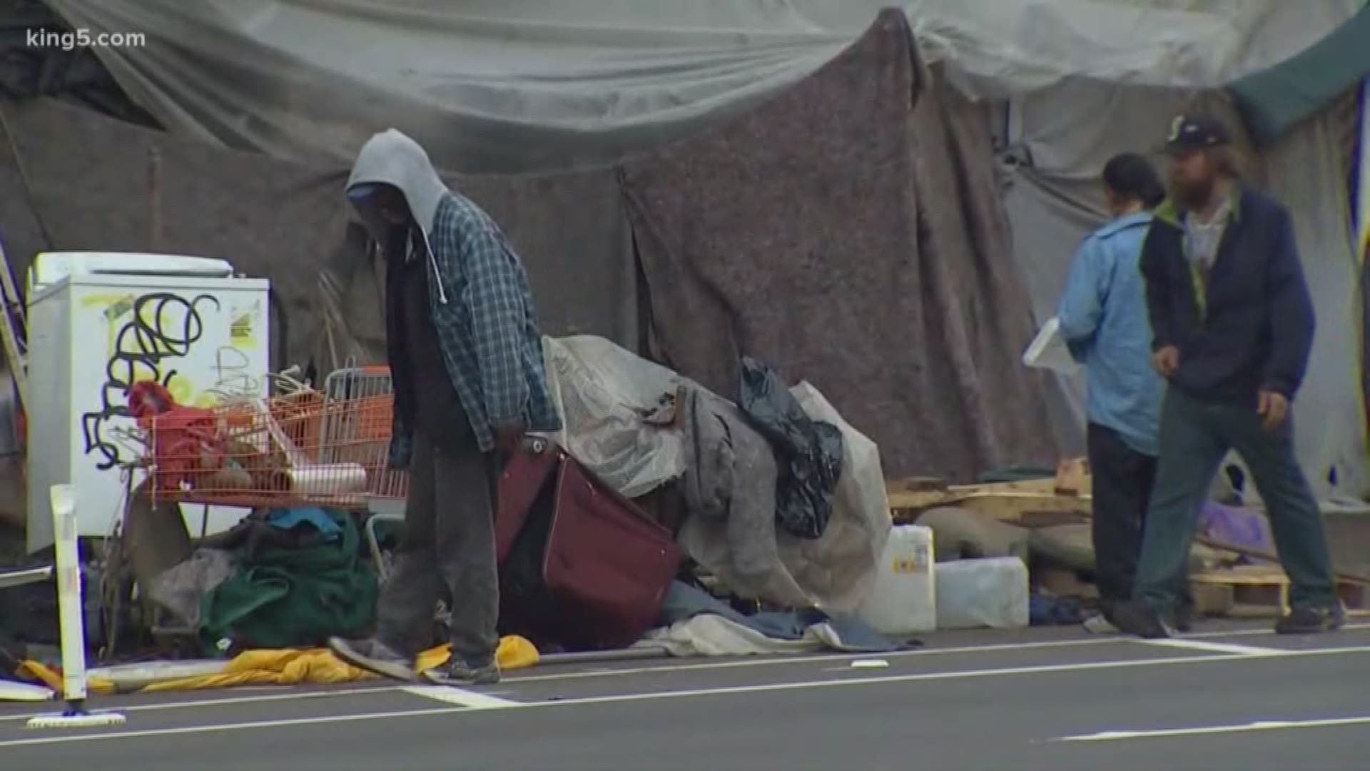 Concerned with biohazards, safety and criminal activity, police are clearing out a homeless encampment at 10th Ave S between Dearborn St. and Weller St. in Seattle.