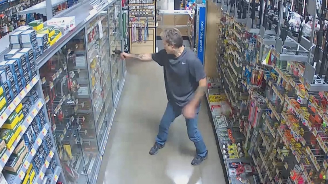 Surveillance shows gunman shoot ammo case at Tumwater Walmart