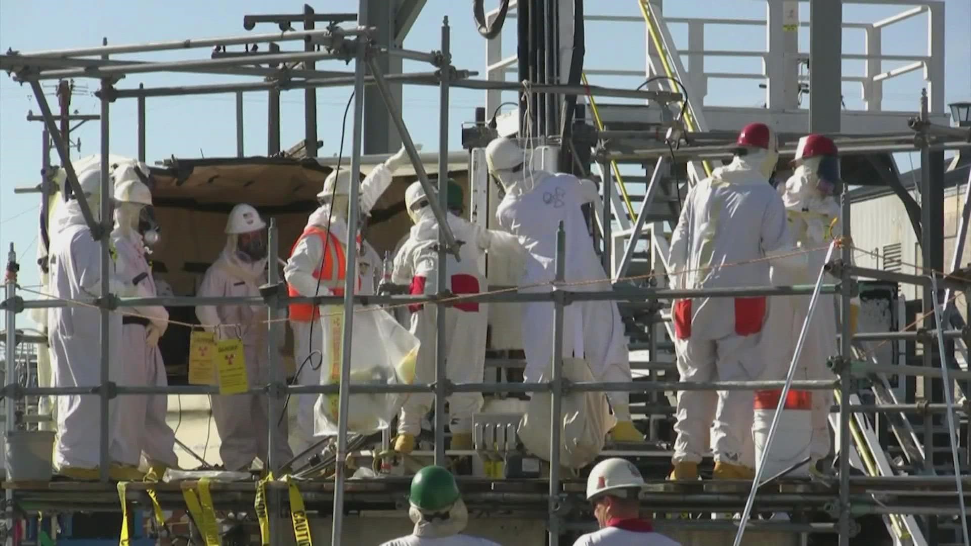 The U.S. Department of Justice announced it will continue the federal government's fight against a state law aimed at helping sick Hanford workers.