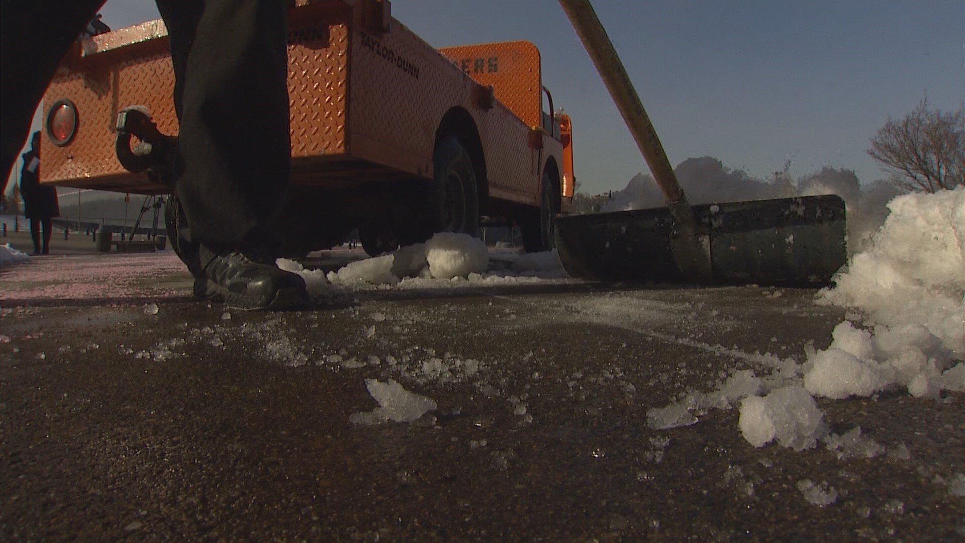 What are the rules for making sure it's safe to walk in parking lots and sidewalks? Is someone responsible for keeping them clear? KING 5's Angela Poe Russell reports.