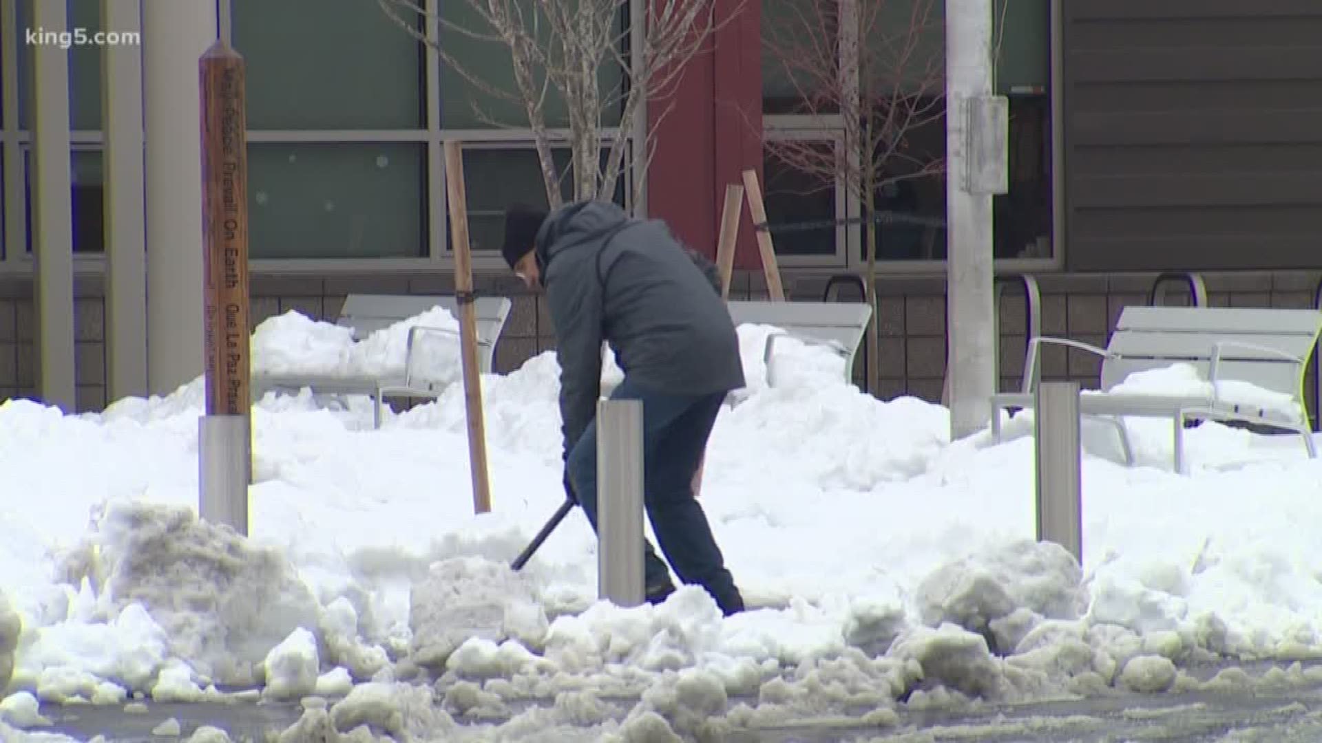 Who is ultimately responsible for clearing streets, and why are some districts making the call even though roads seem clear? KING 5's Chris Daniels joins us with what the situation looks like outside Seattle.