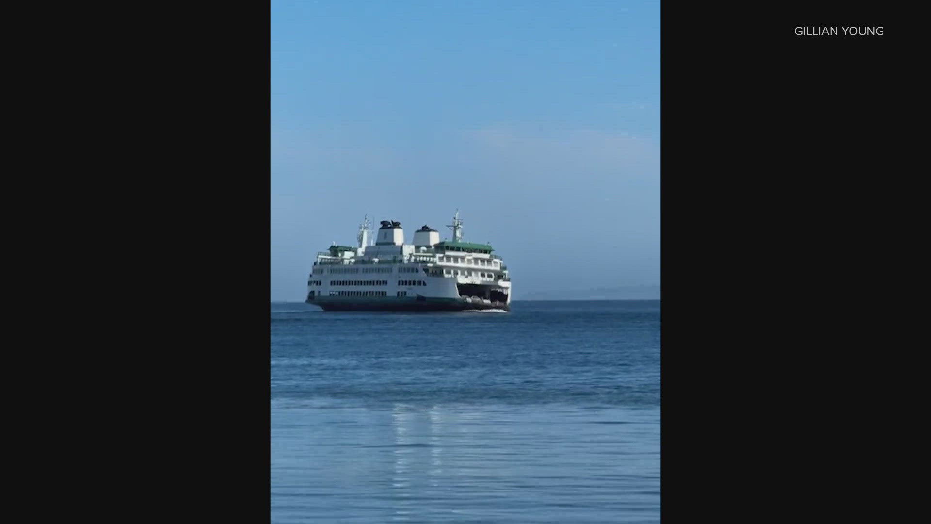 A large Navy ship's wake caused a Washington State ferry to rock back and forth near Edmonds